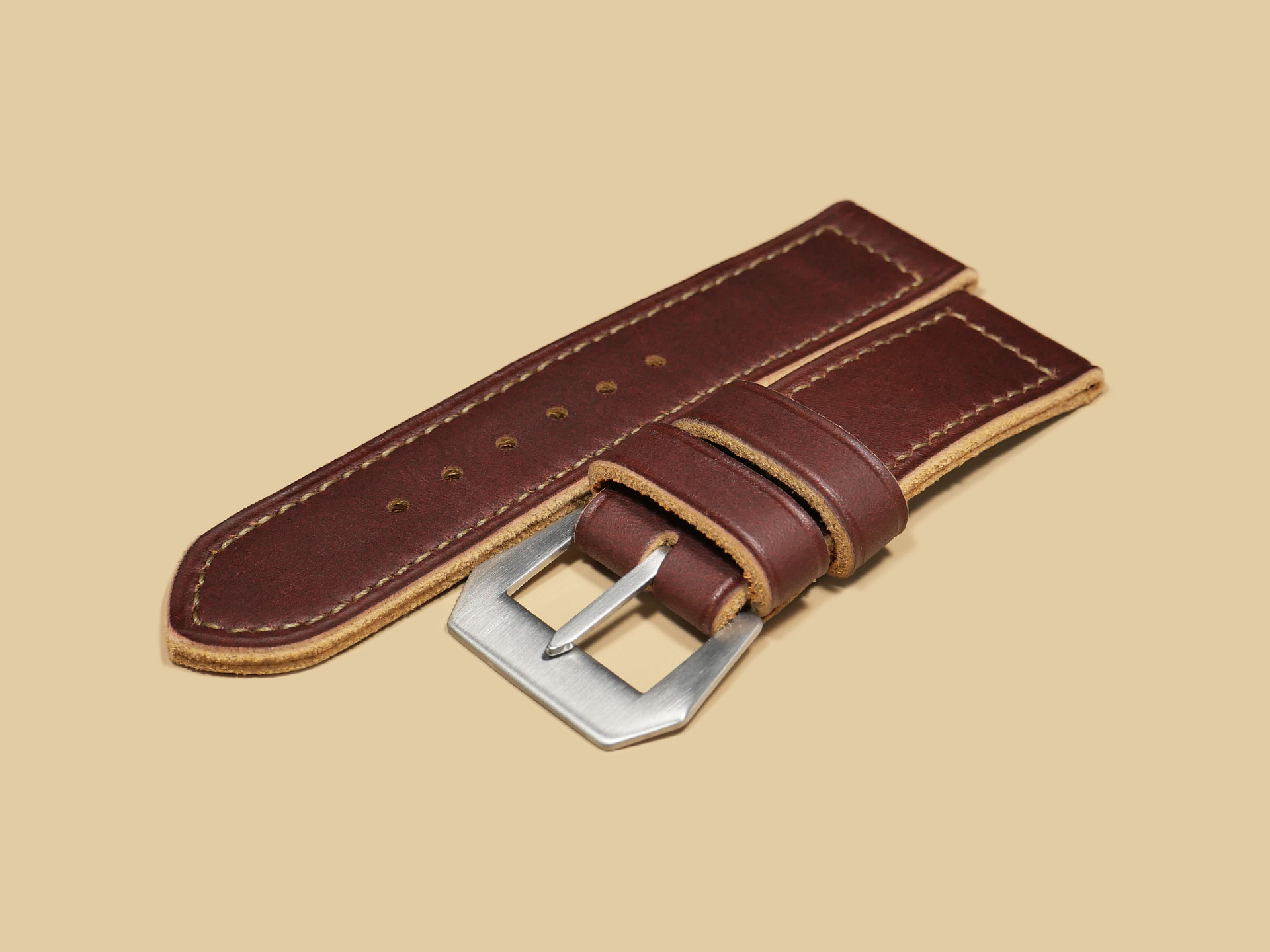 Soft Panerai Strap 47mm displayed on a wooden surface.