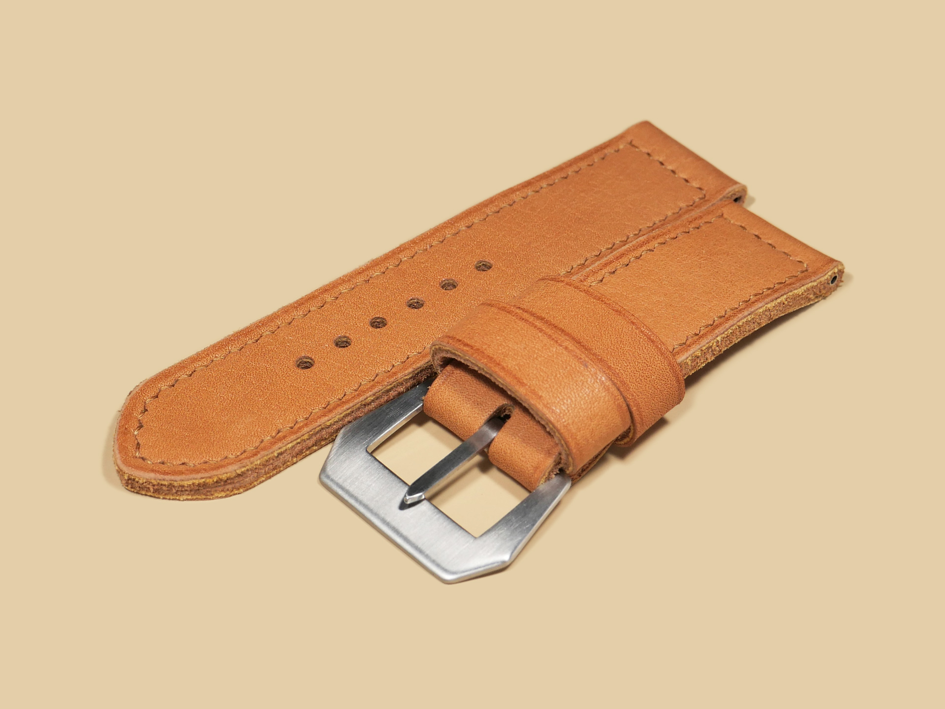 Close-up of a Thick Orange Panerai strap for 47mm Panerai watches with waxy finish