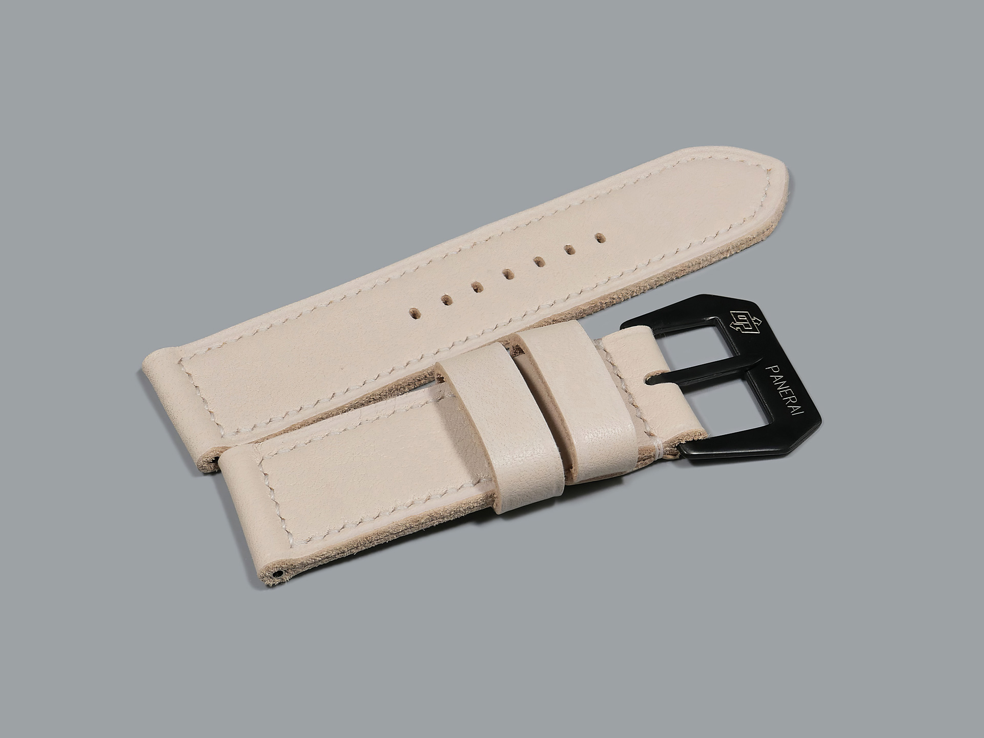 Side angle of white leather Panerai strap on PAM00372