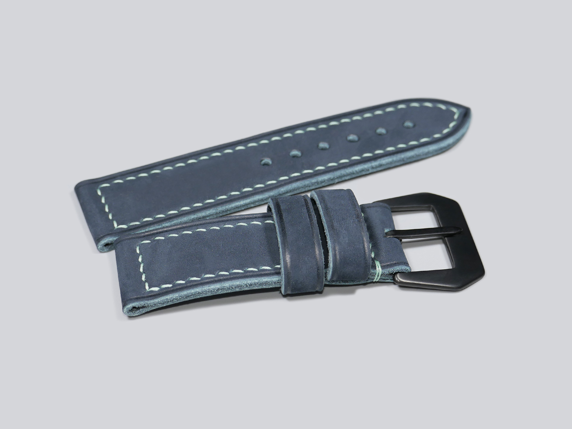 Flat lay of Suede Blue Panerai Strap Handmade by Marcello Straps