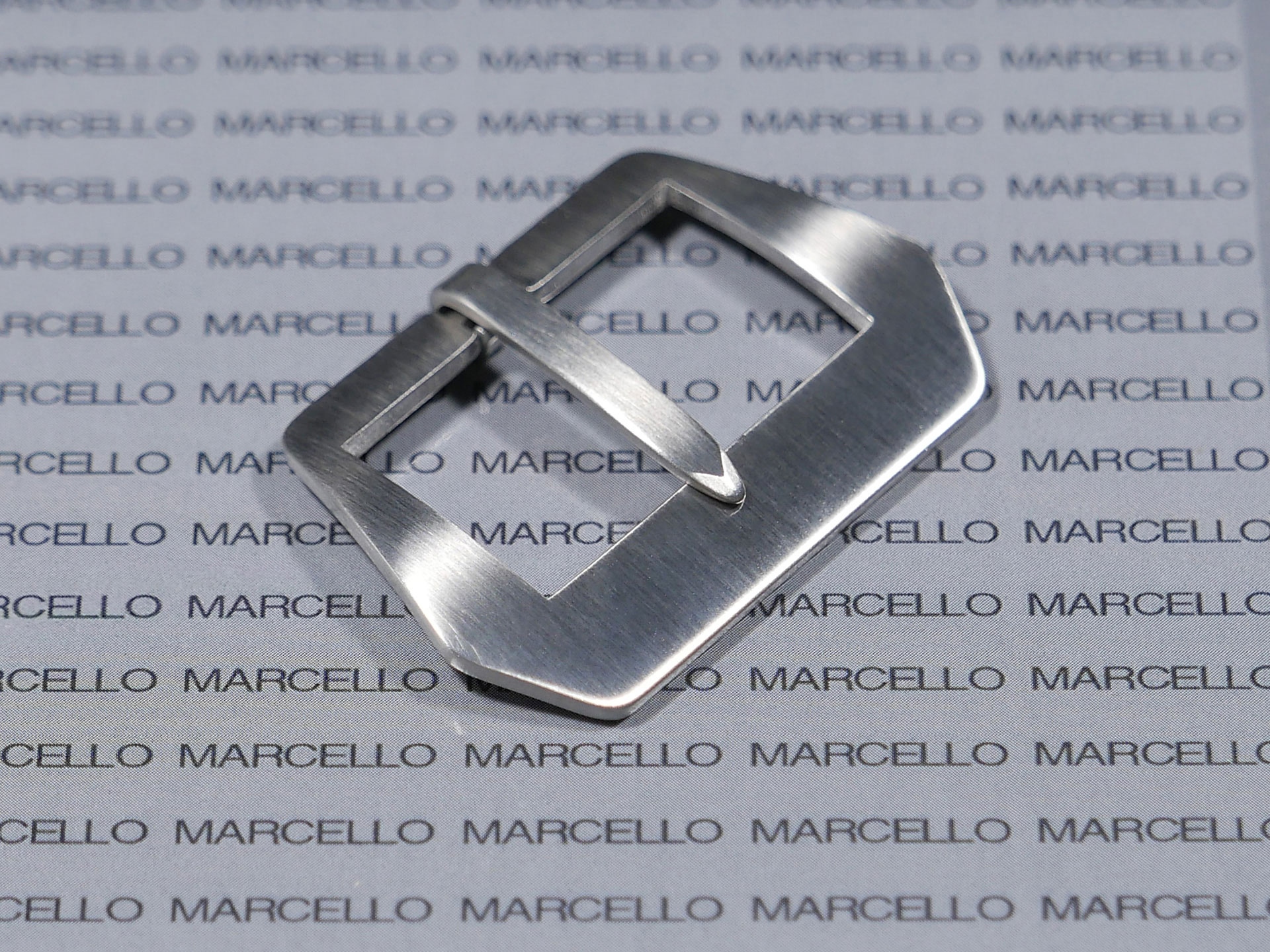 Close-up of a vintage Panerai pin buckle in 26mm size with historical shape