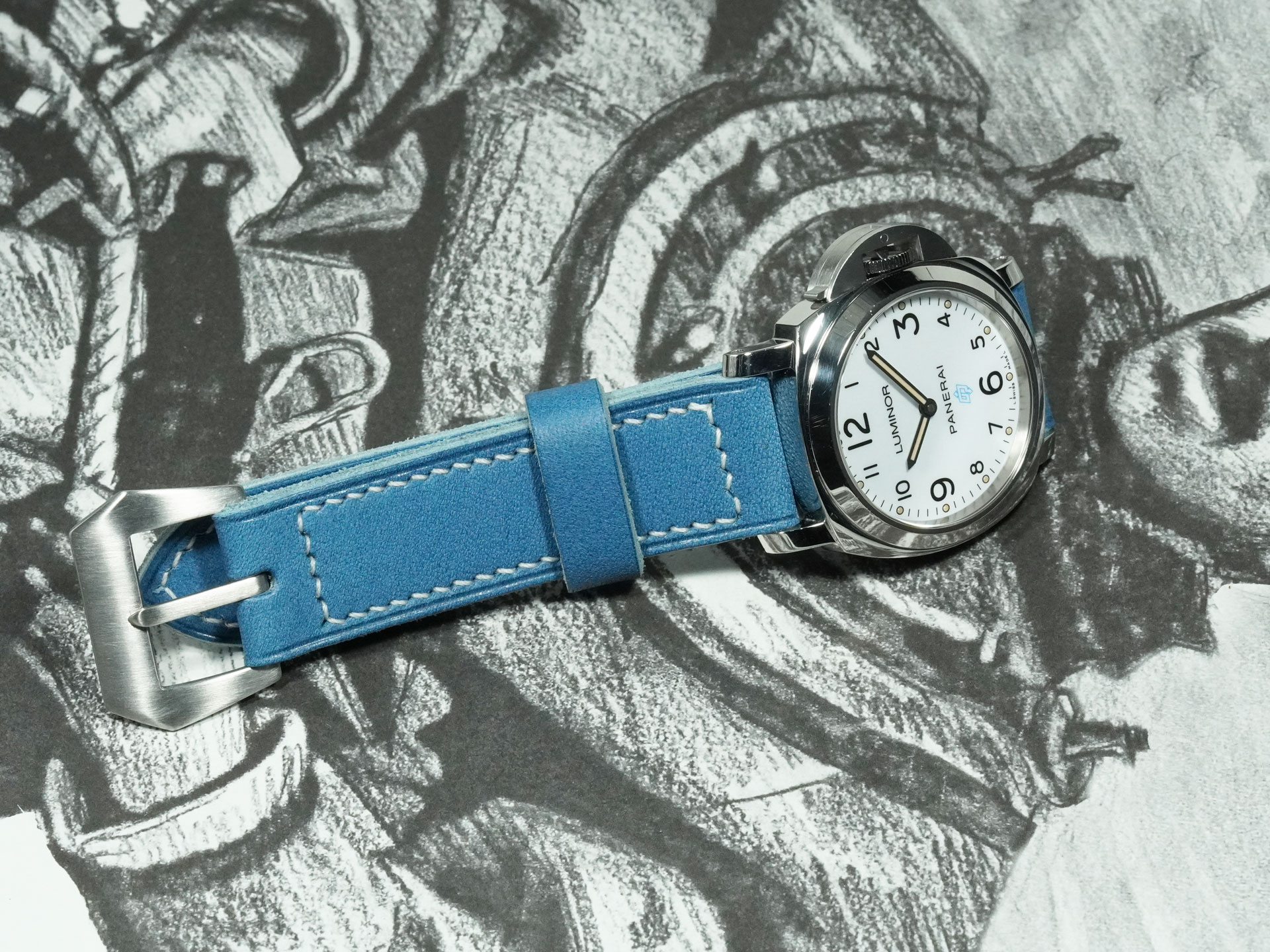 Blue Panerai strap highlighting traditional hand-finished leather edges