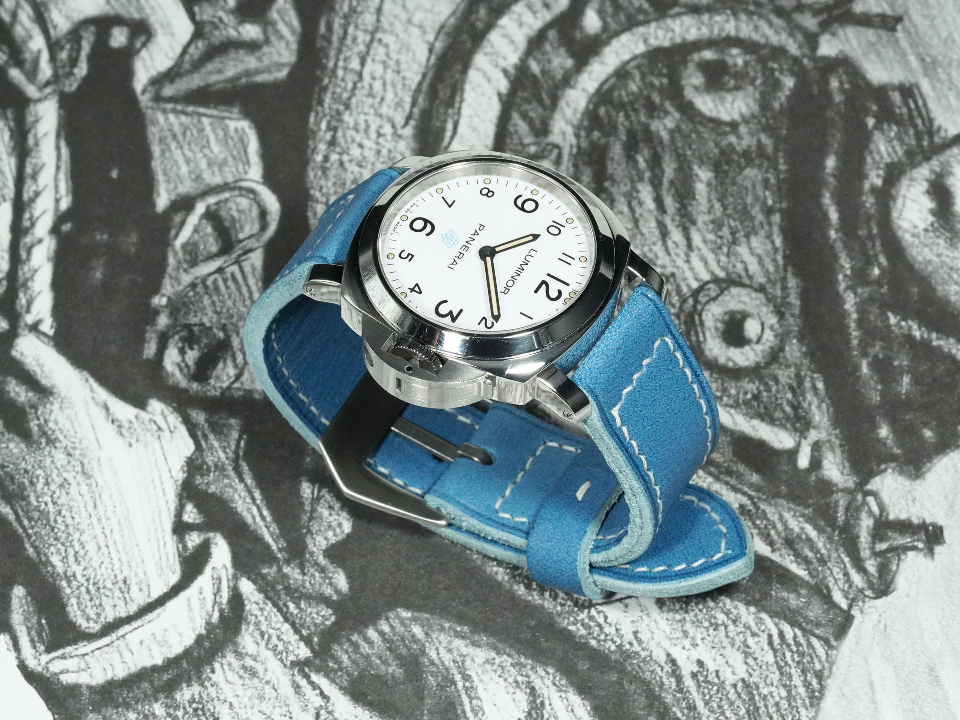 Blue Panerai strap showcasing sharp white stitching and bold design