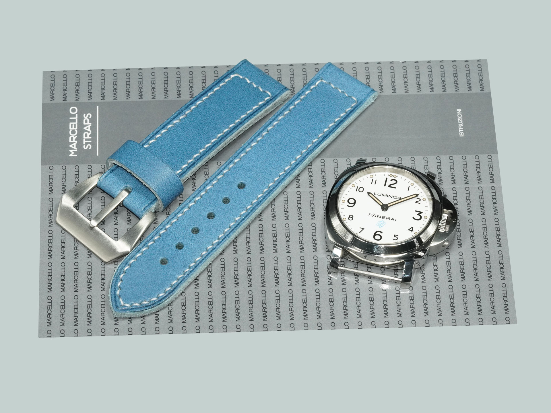 Blue Panerai strap paired with Panerai PAM00775 Luminor model