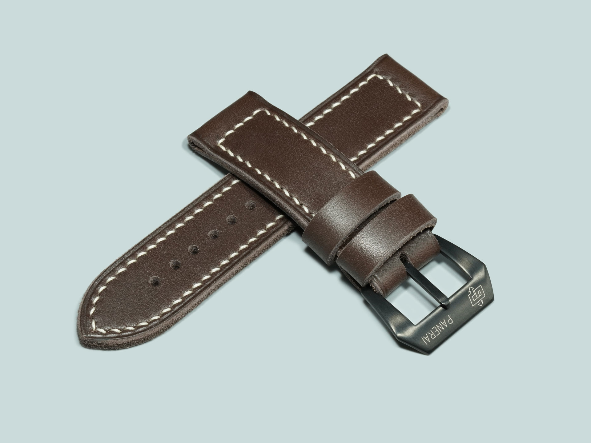 Thick Dark Grey Panerai strap with black buckle flat lay