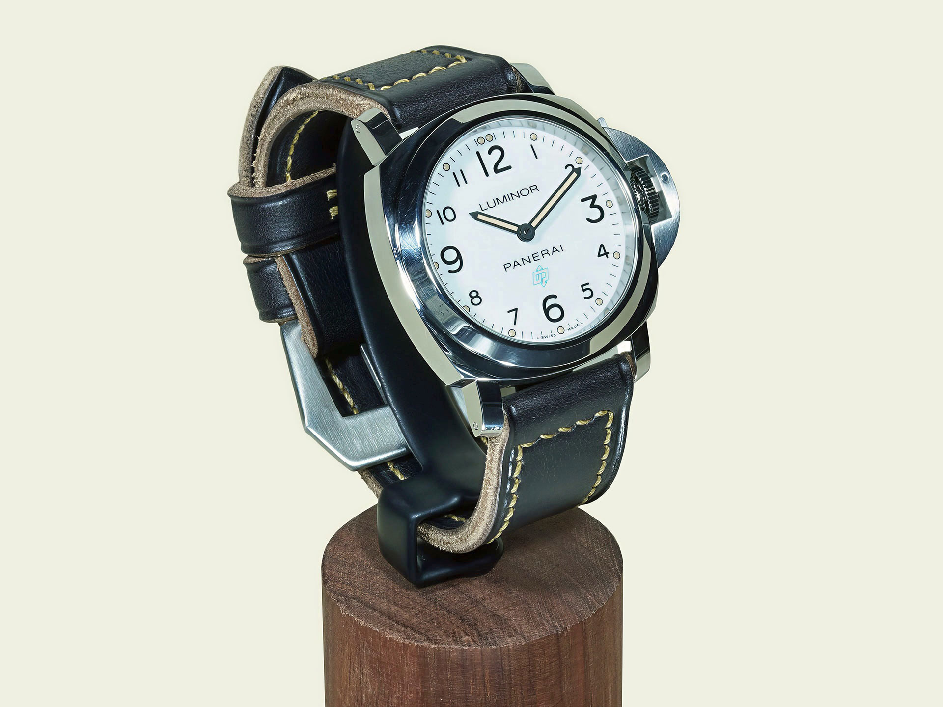 side view of black Panerai Luminor strap on stainless steel Luminor watch