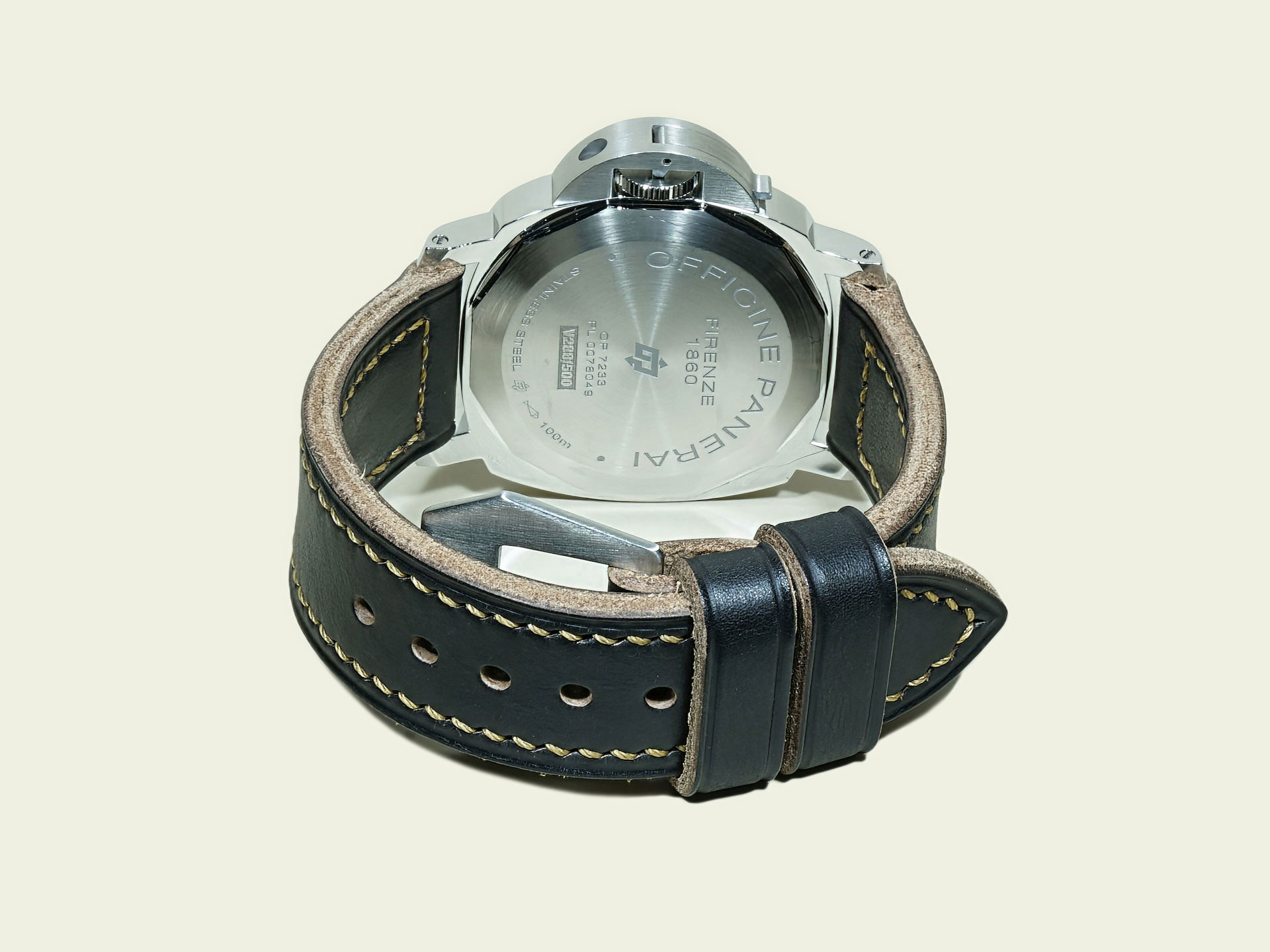 black Panerai Luminor strap with smooth creased edges and flat buckle