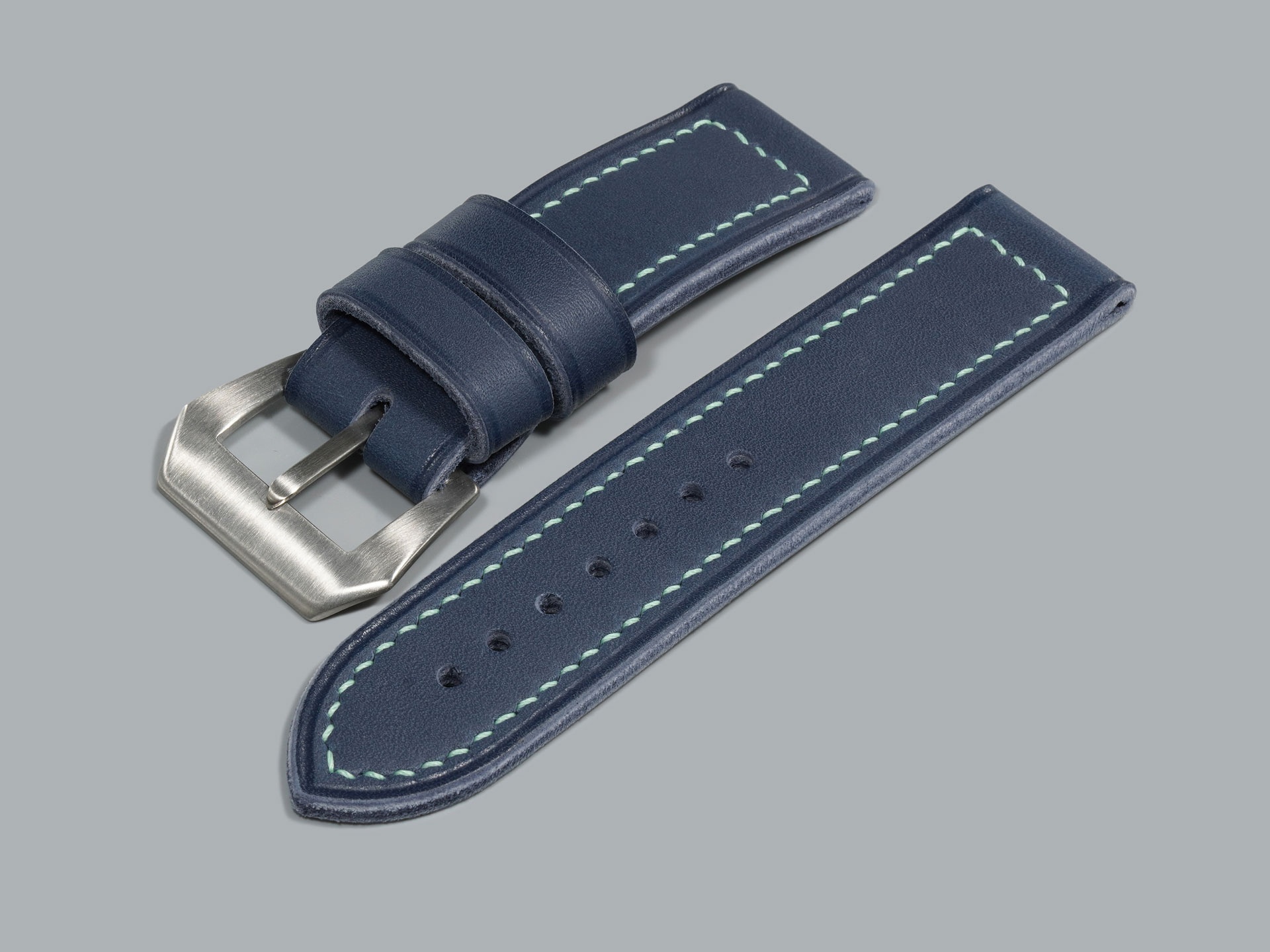Blue Panerai strap with light blue stitching and curved Pre-V buckle