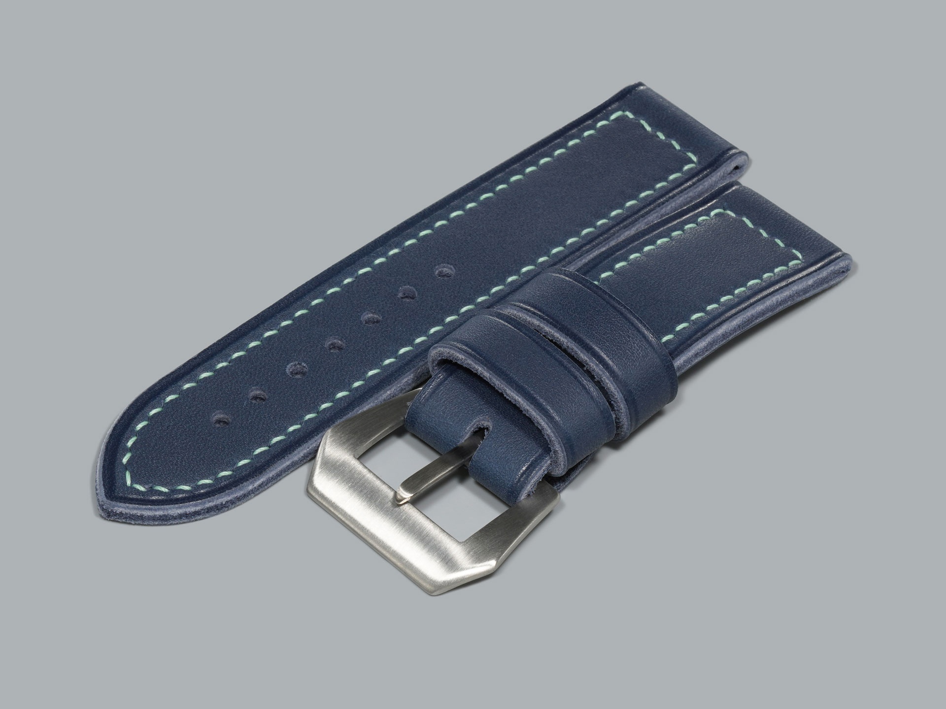 Handmade blue Panerai strap with creased edges and stain-resistant leather