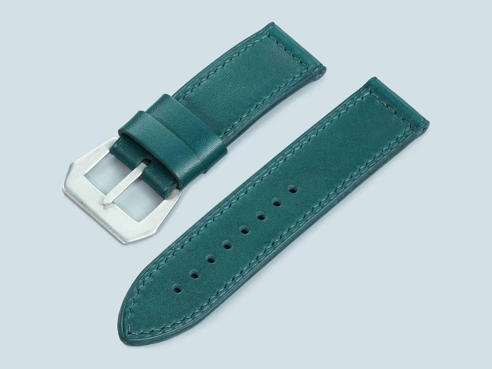 Teal green 47mm Panerai strap with color matched handstitching and vintage style pin buckle sewn in place