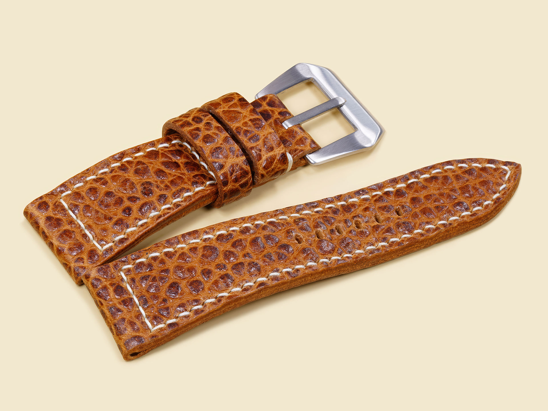 Thick brown buffalo leather Panerai Radiomir strap with sewn-in buckle.