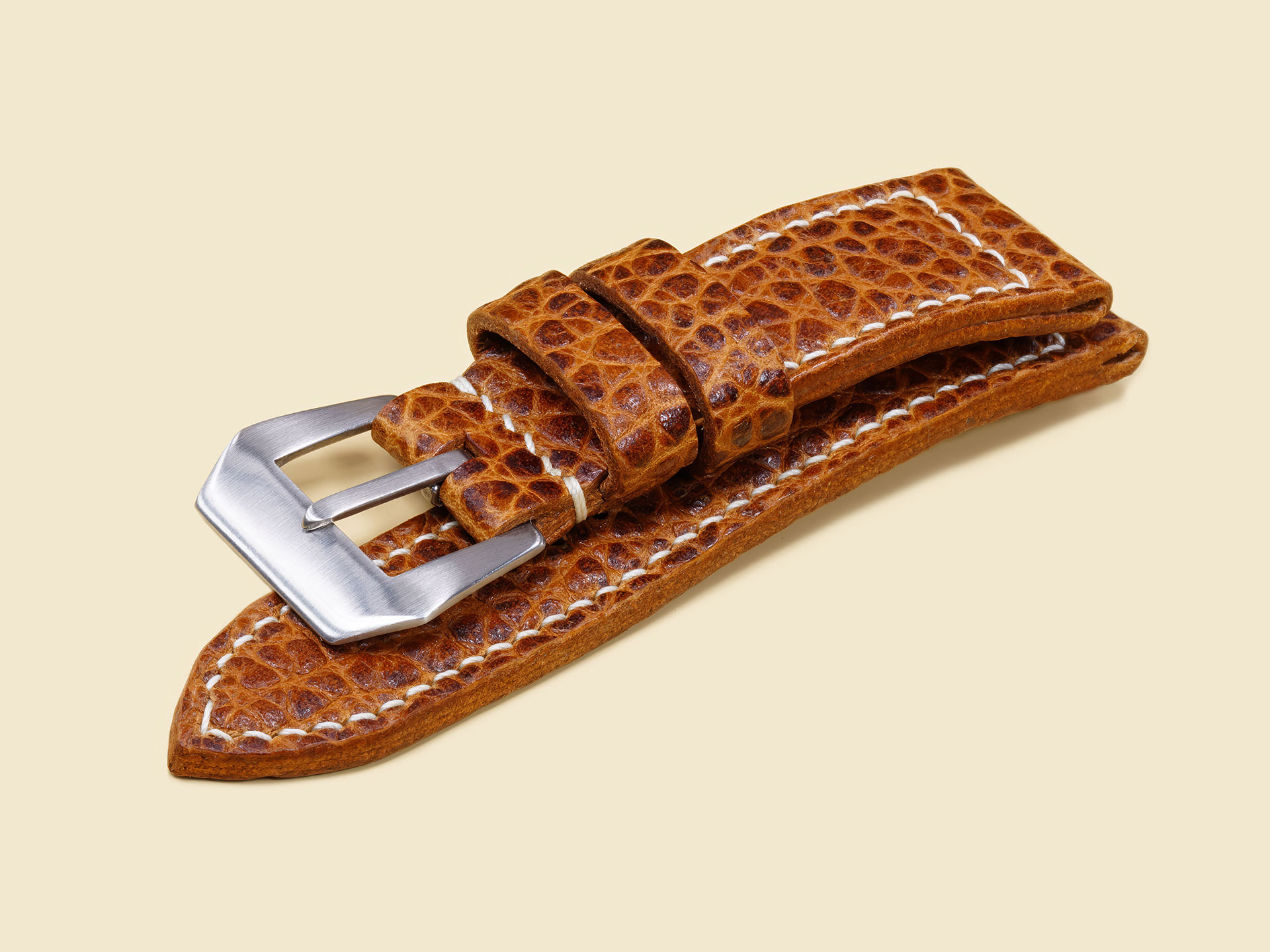 Hand-stitched ivory thread on brown buffalo Panerai Radiomir strap.