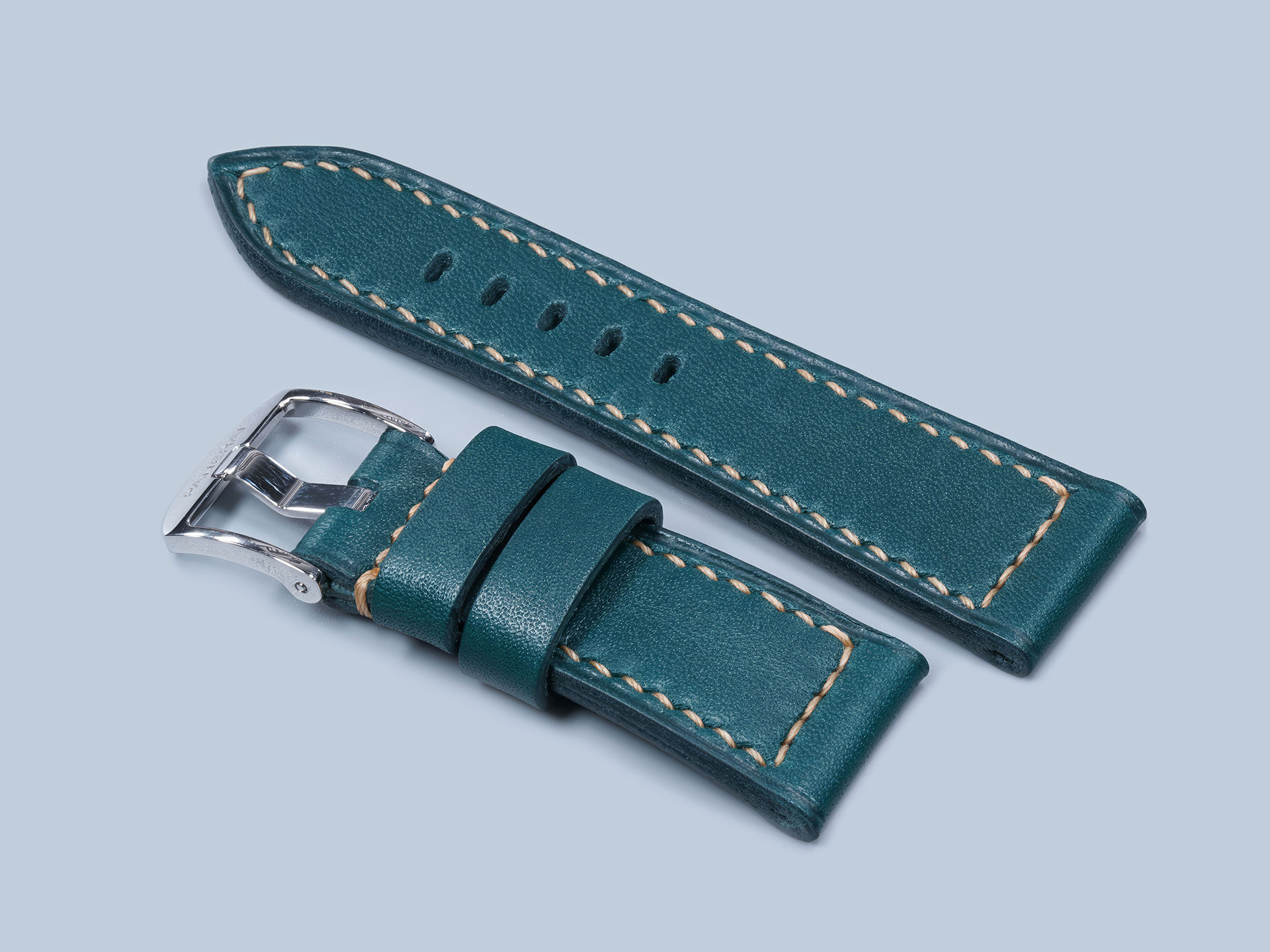 Macro shot of a handmade strap in dark teal for Panerai Due 42mm.