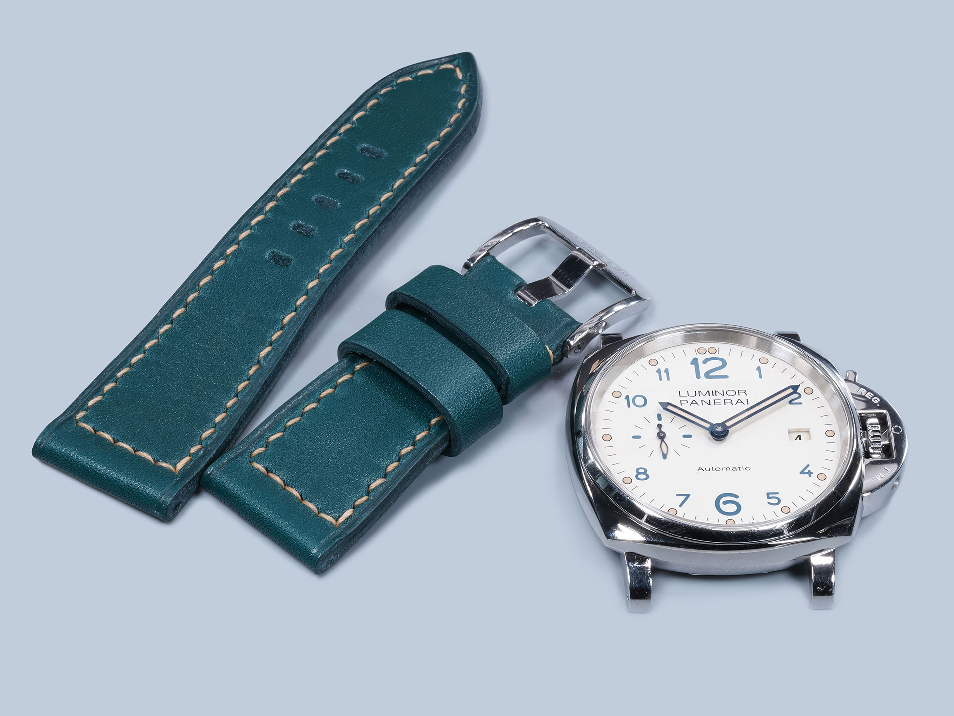 Panerai Due teal leather handmade strap showing beige French poly thread.