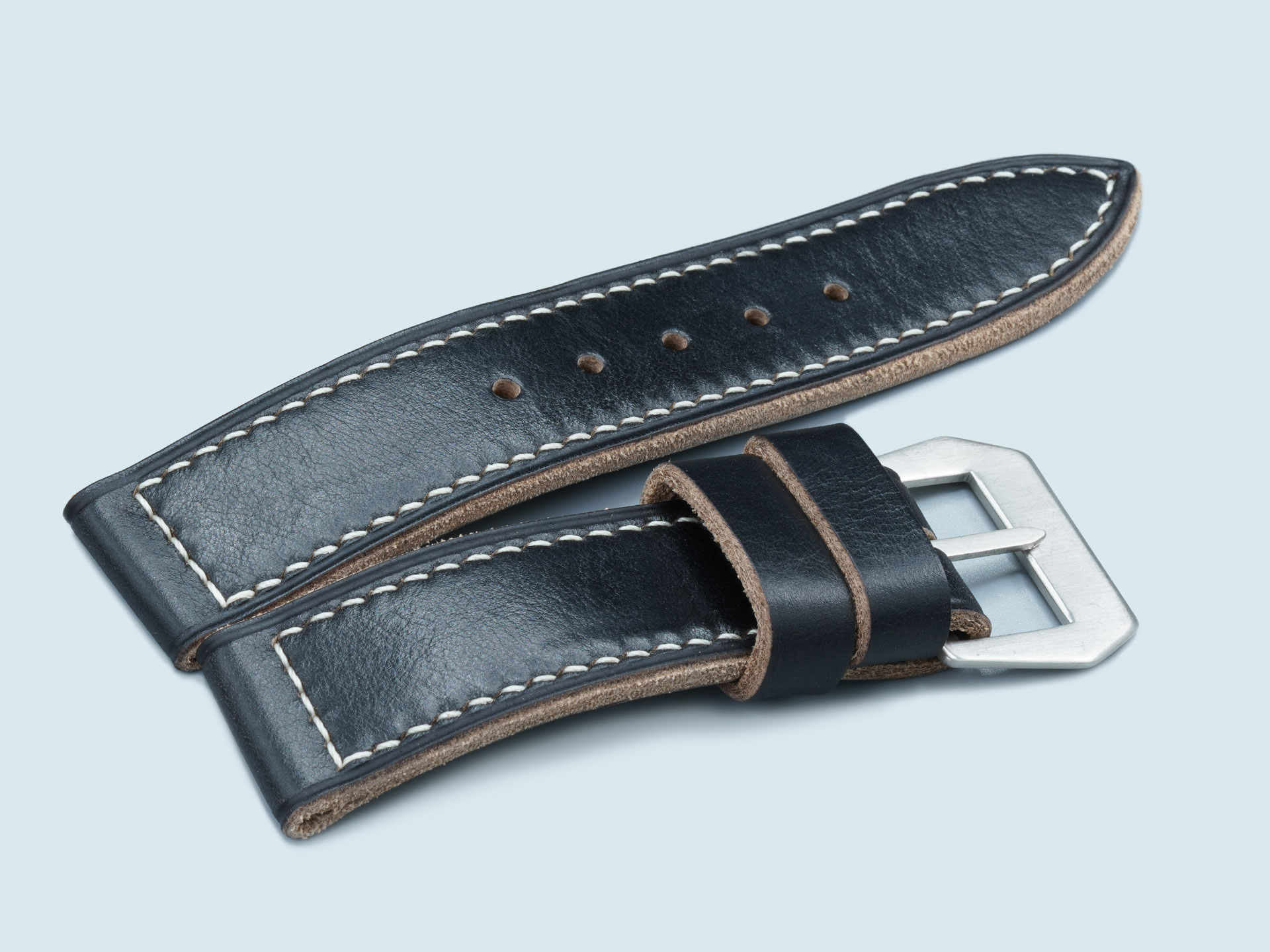 Close-up of grain texture on black oil-tanned leather for Panerai.
