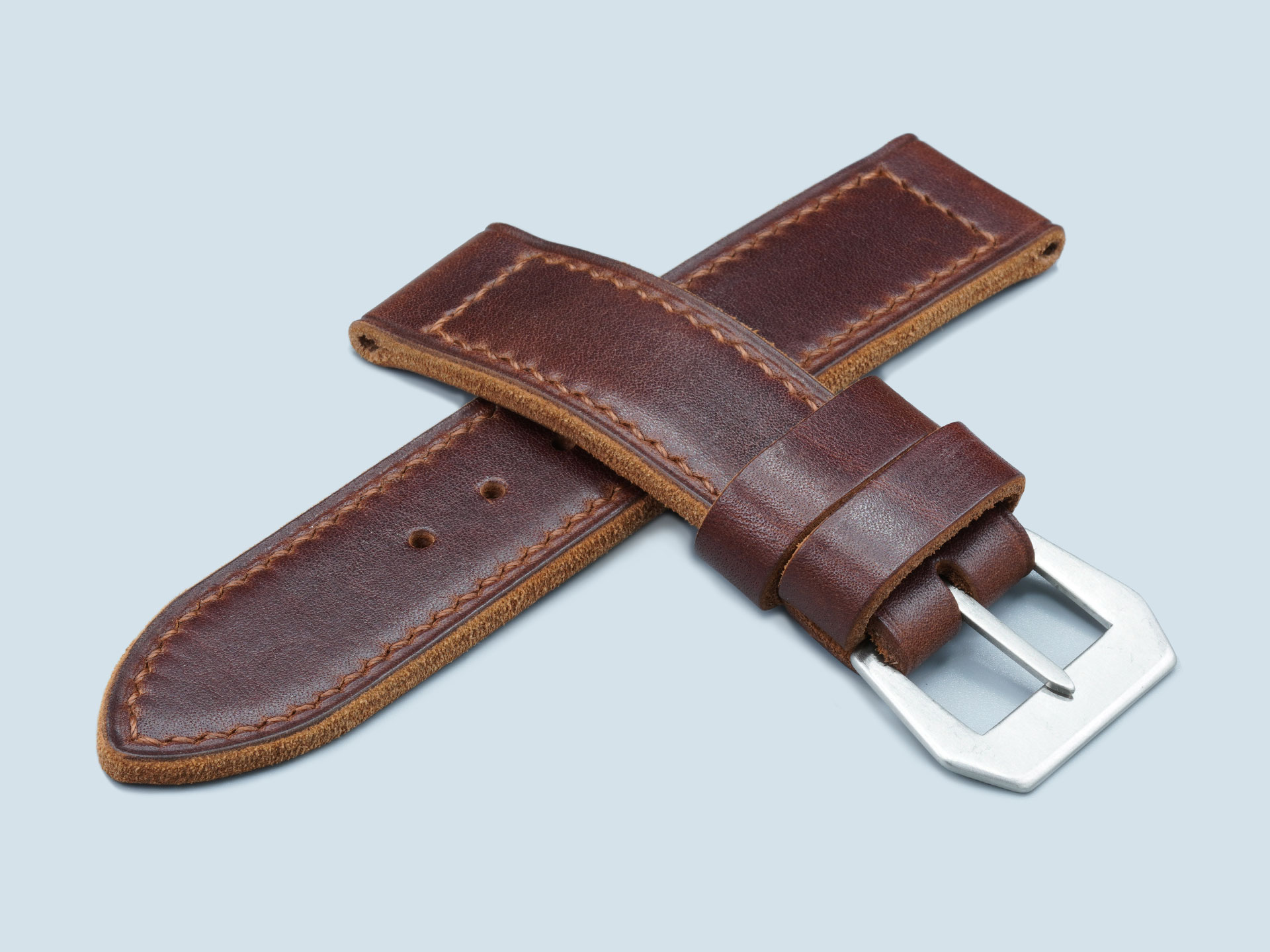 Panerai style flat buckle on brown vintage leather strap.