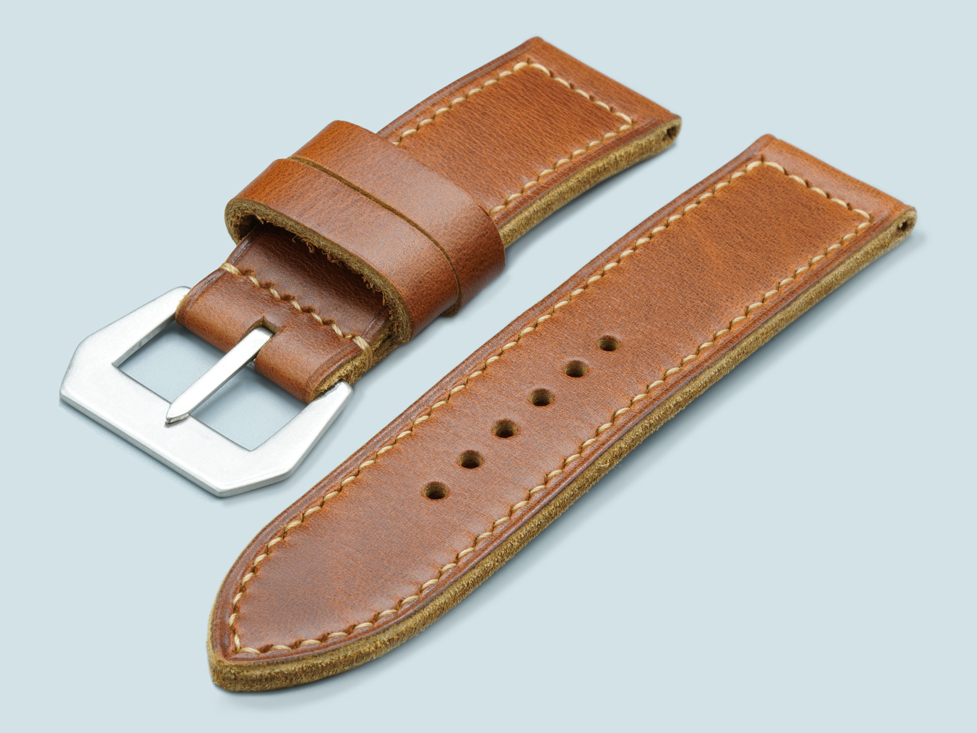 Handcrafted tan leather Panerai strap featuring a vintage flat buckle, built for 47mm cases