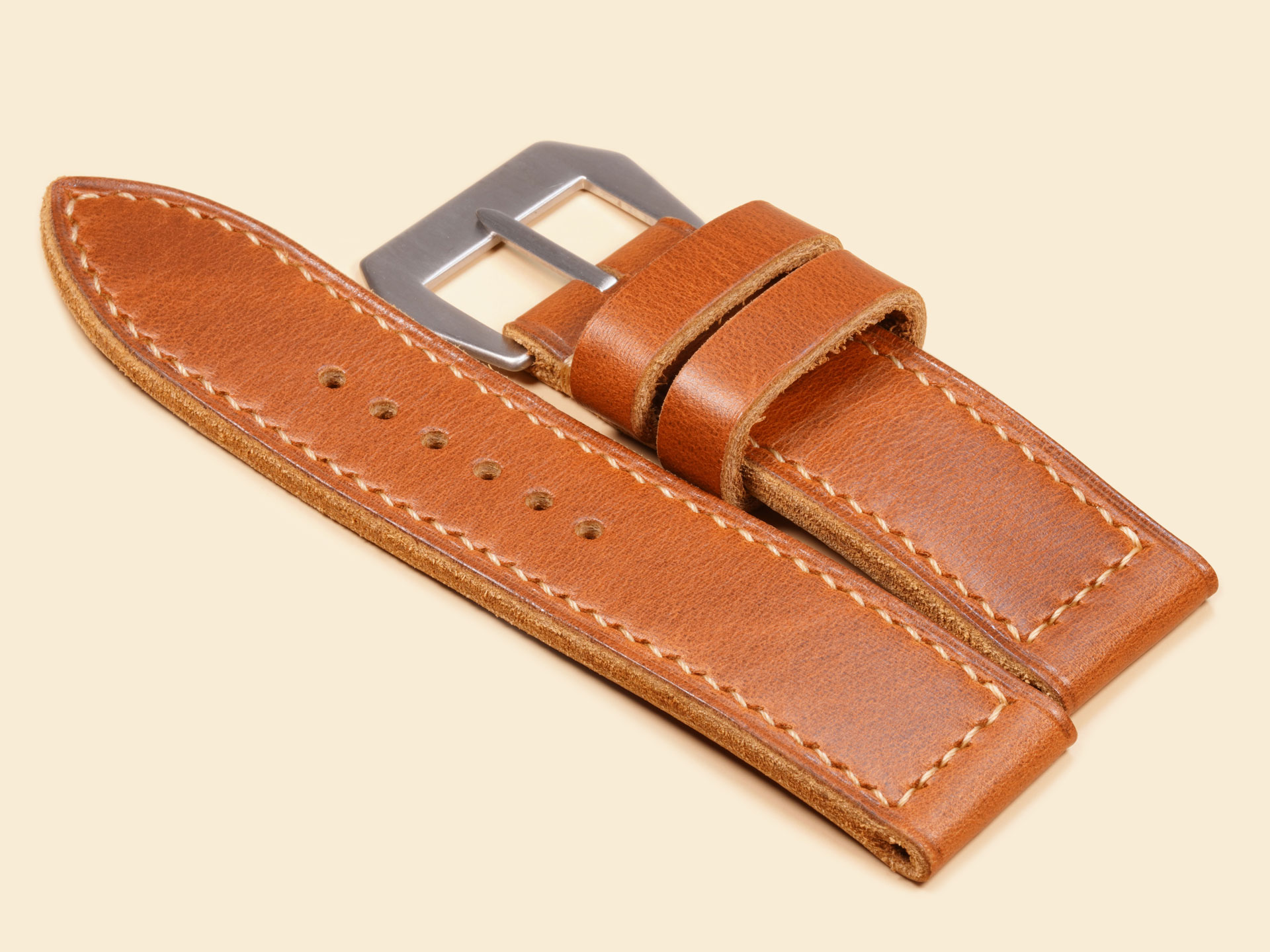 Straight profile tan leather watch strap paired with a vintage brushed steel GPF buckle.
