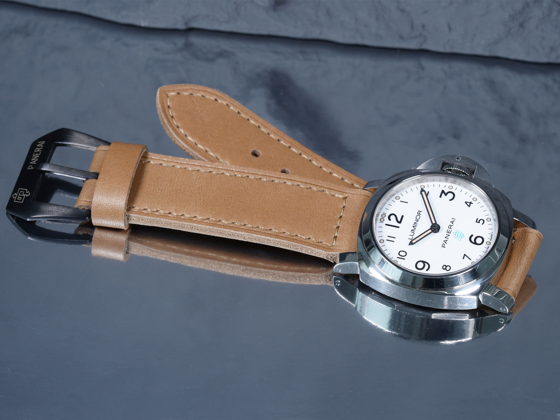 Wrist shot of the tan 44mm strap, handcrafted by Marcello Straps