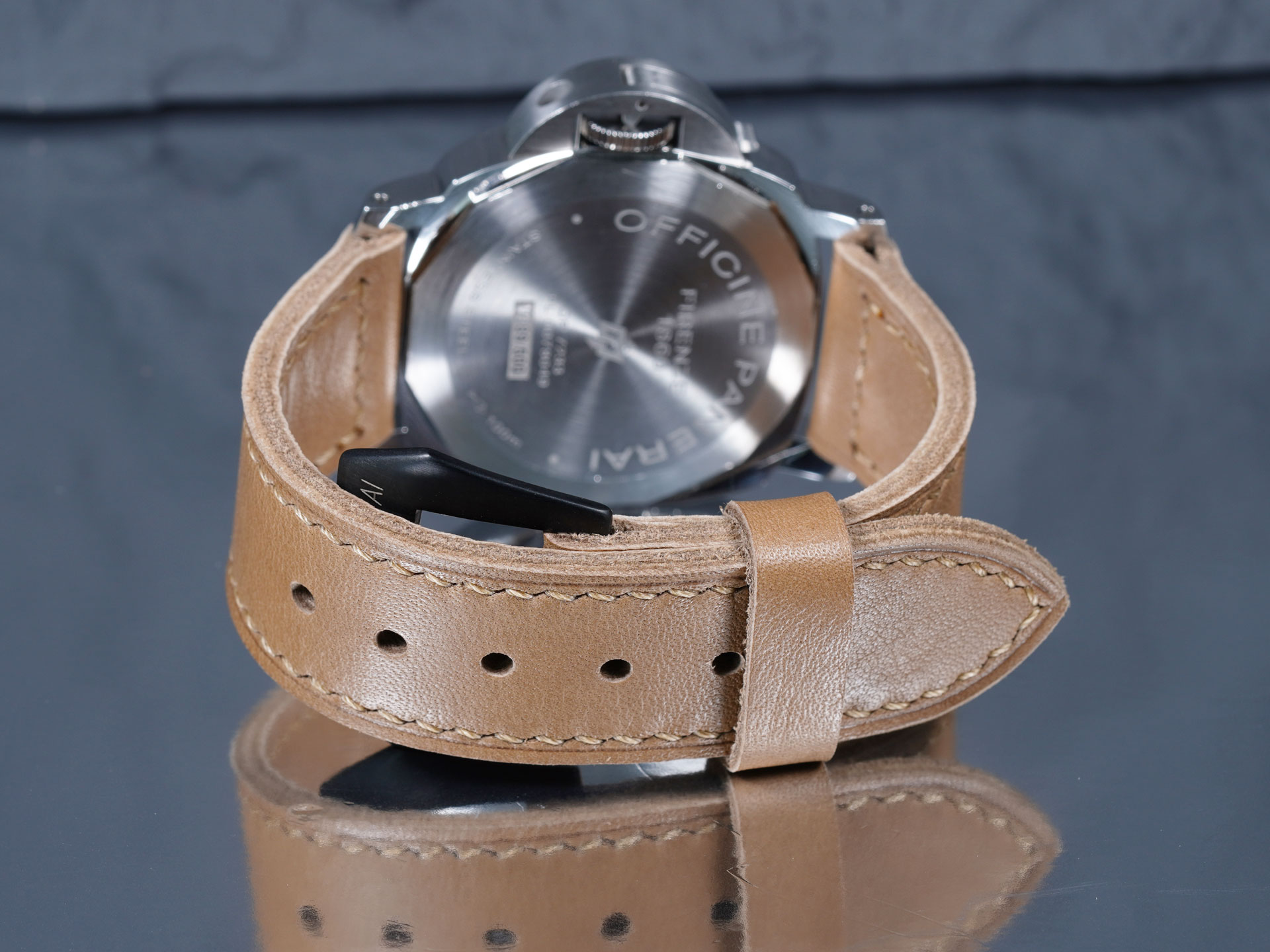 Vintage tan strap detail, edges and keepers shown up close
