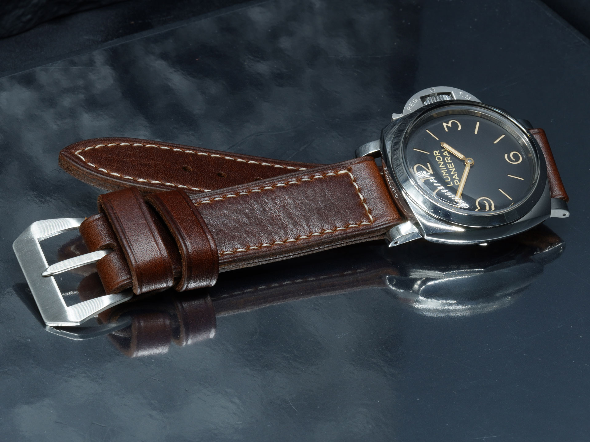 47mm Panerai Luminor case paired with a dark brown, vintage style handcrafted strap