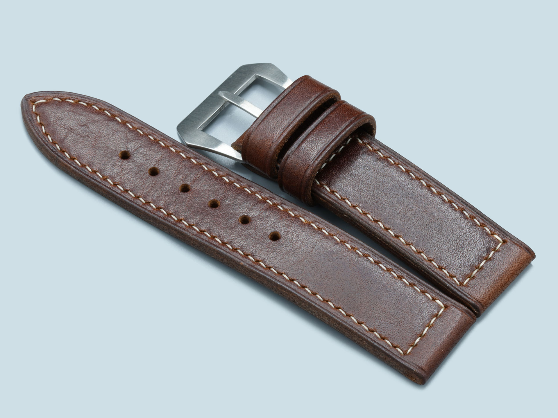 Marcello Straps' dark brown vintage strap for 47mm Luminor, angled to show taper