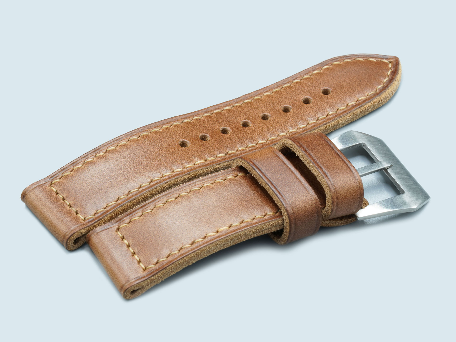 Handcrafted caramel brown Panerai Luminor strap worn on the wrist, 44mm fit
