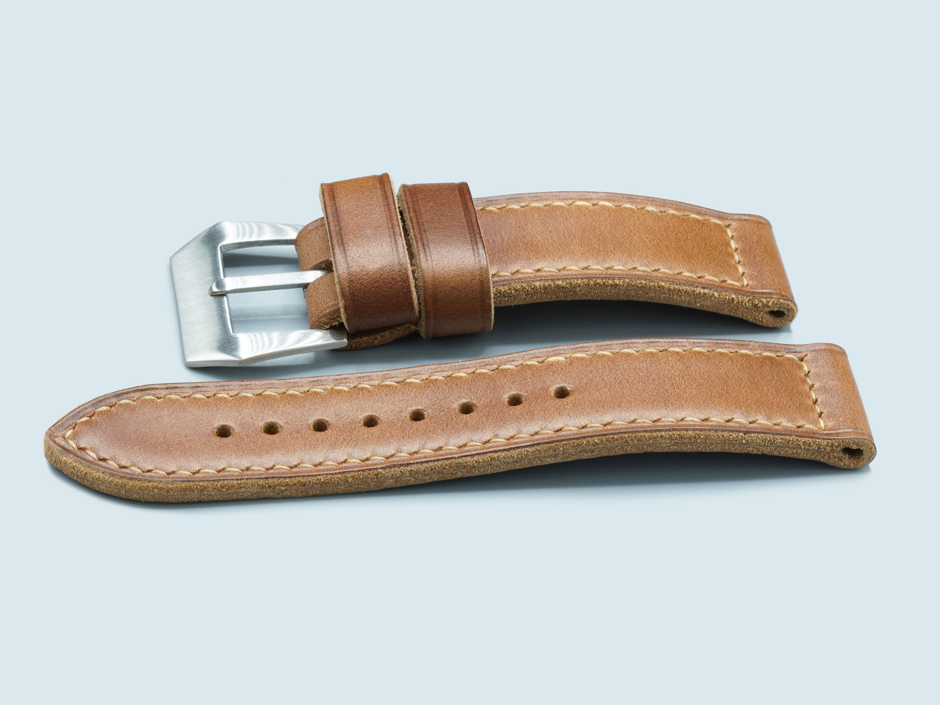 Boxed hand stitching on a caramel brown Panerai Luminor strap, 44mm handcrafted