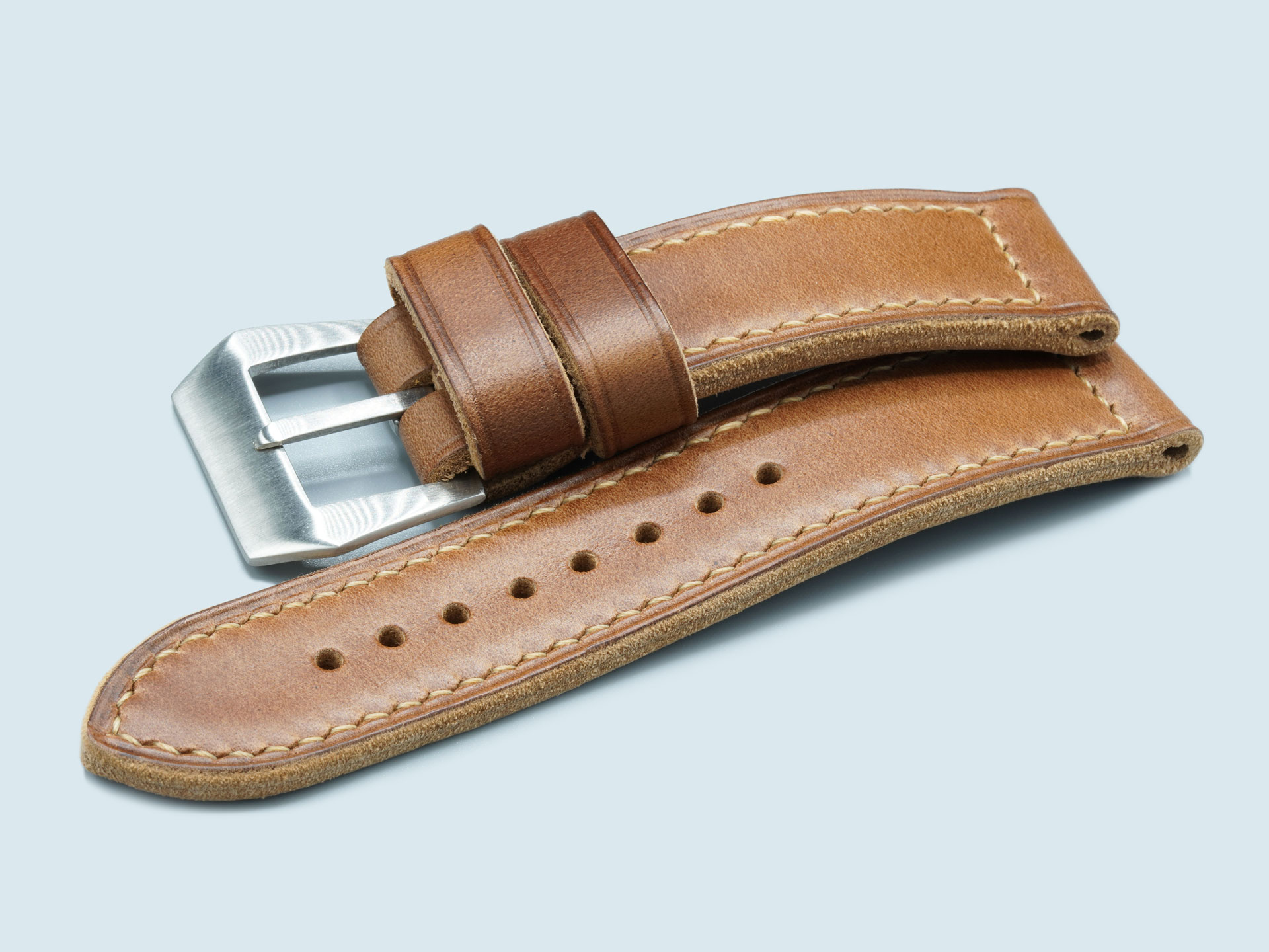 Floating keeper detail on a thick handcrafted caramel Panerai Luminor strap