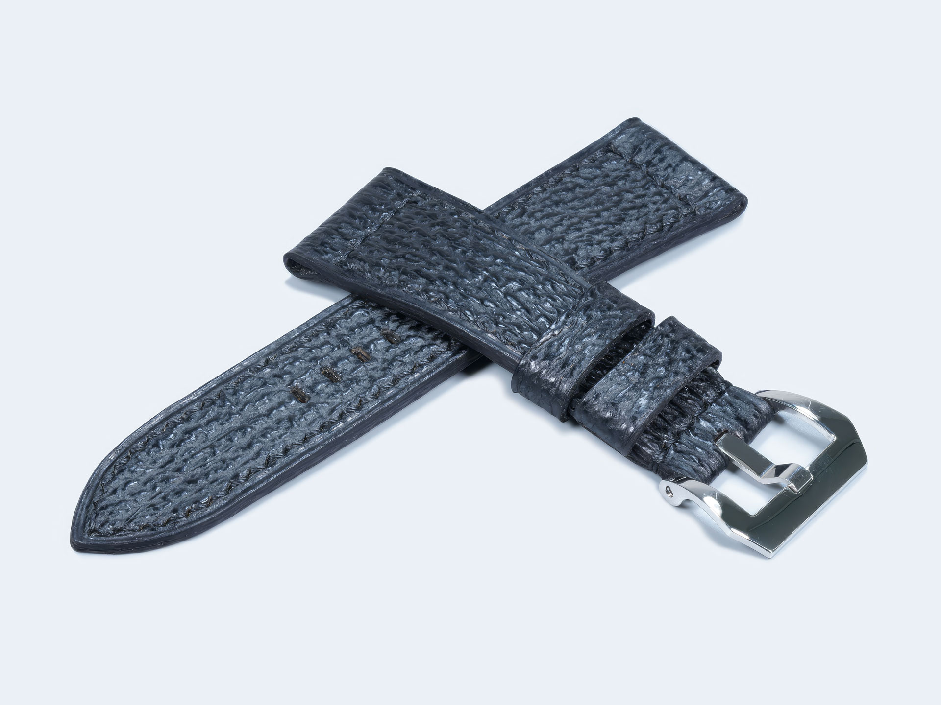 Close-up of Squalo Nero Panerai Radiomir strap showing the rugged texture of black shark leather.