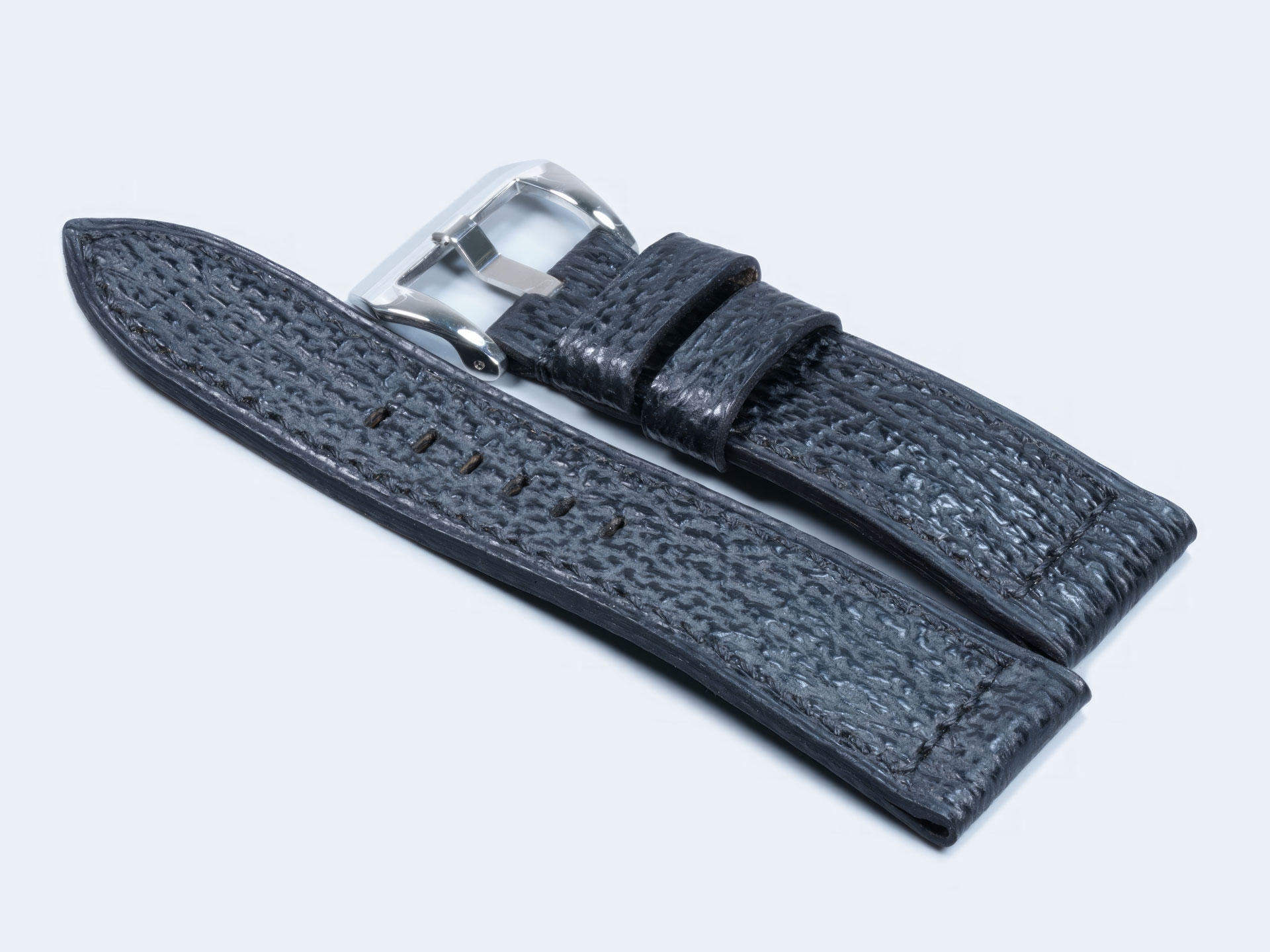 Squalo Nero black shark leather watch band featuring artisanal hand-finished black stitching.