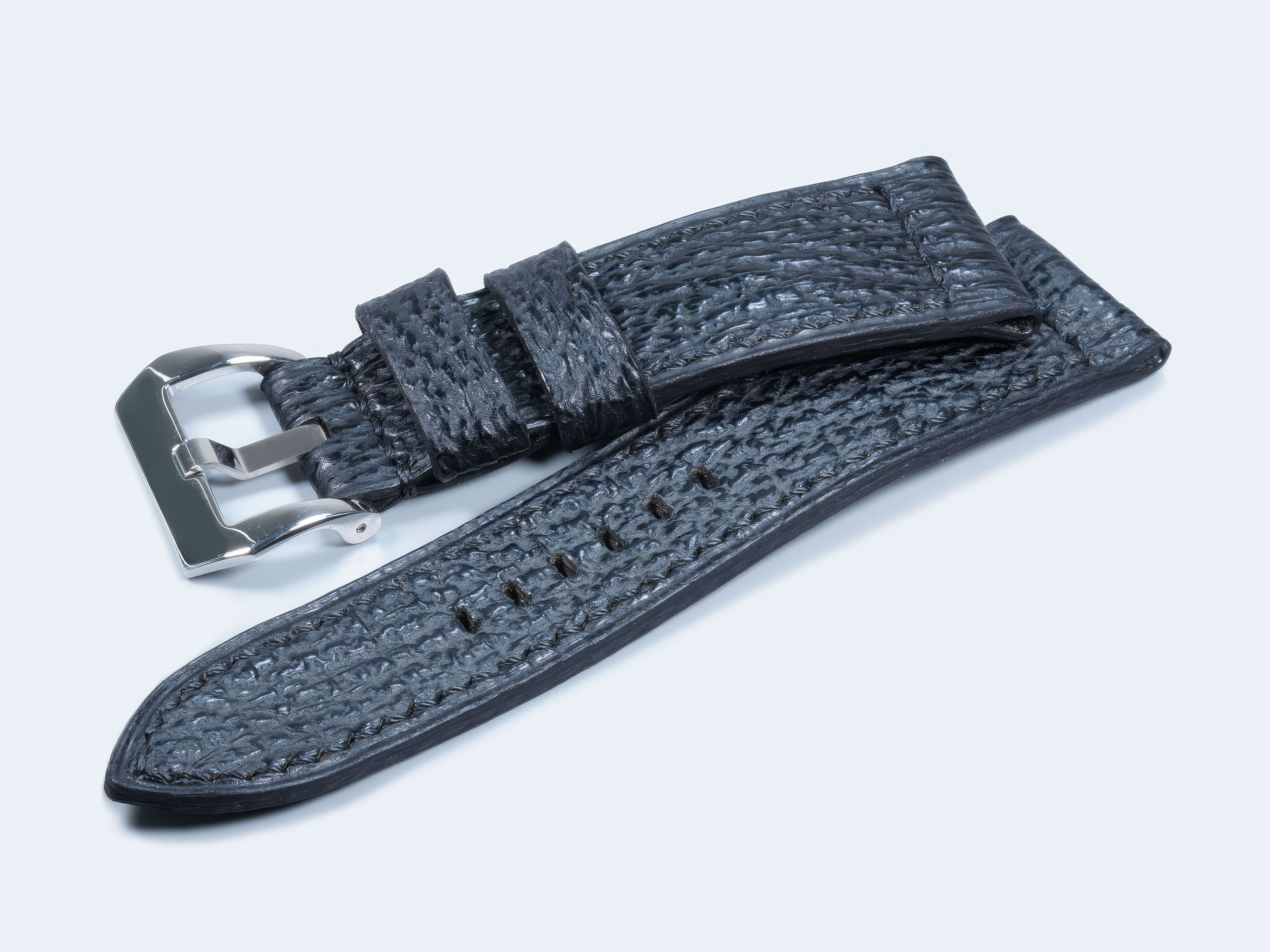 Detail shot of the tapered profile on a custom Panerai Radiomir shark strap in matte black.