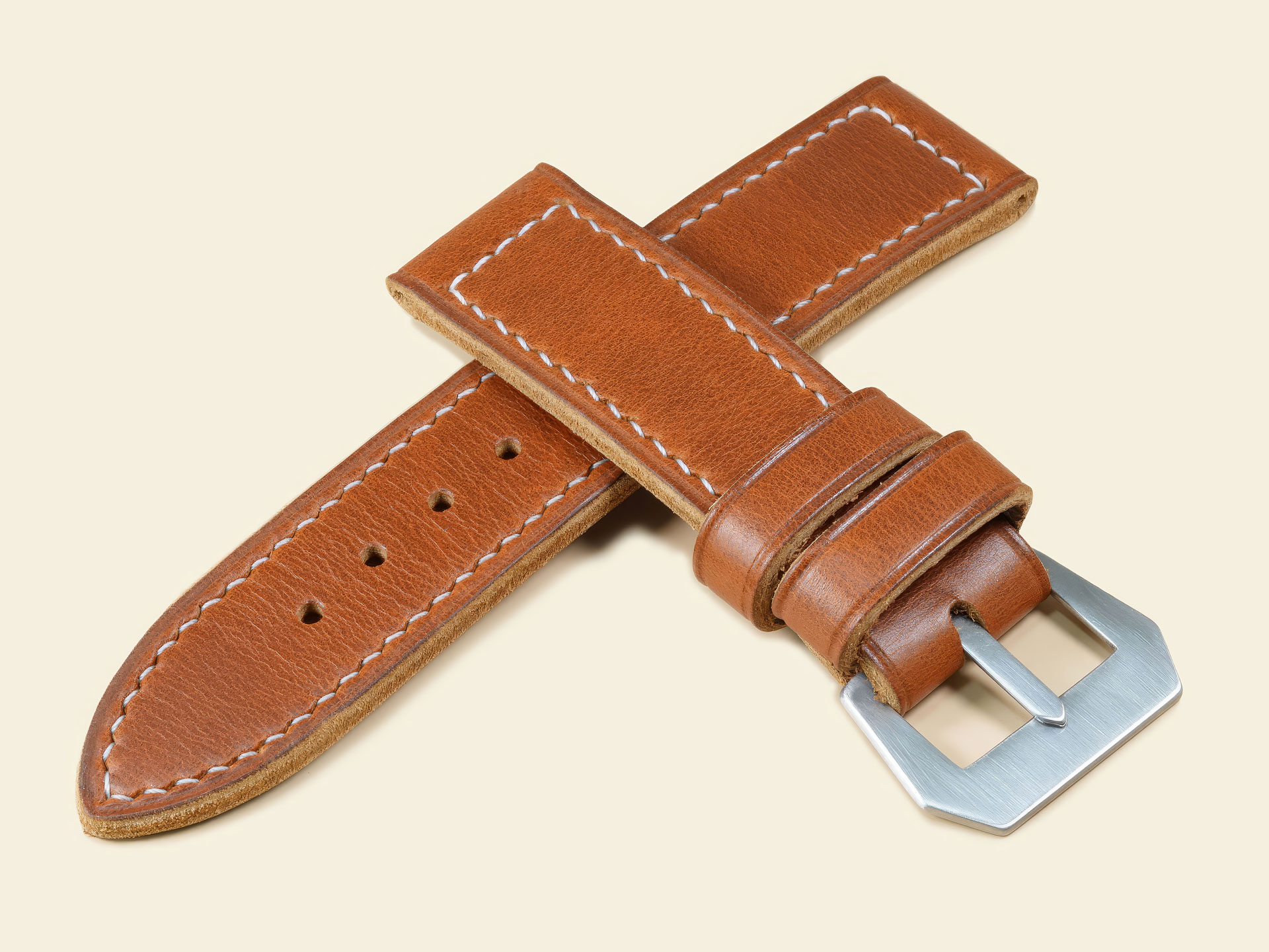 Distressed tan leather watch strap on a 47mm vintage Panerai case with GPF buckle.
