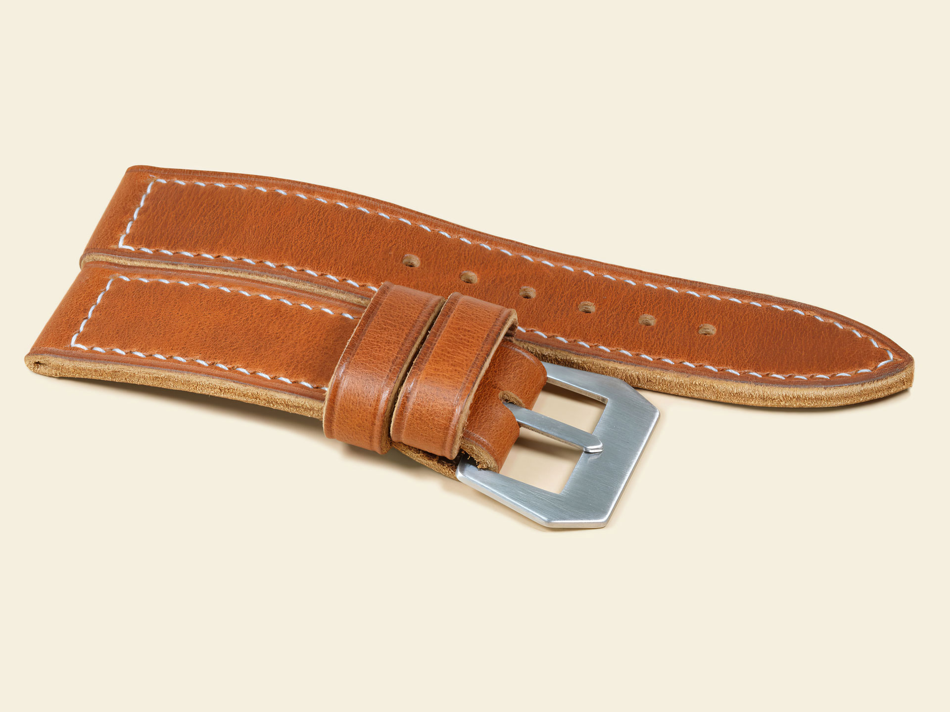 Vintage-style 47mm Panerai strap in supple tan leather with a brushed GPF steel buckle.
