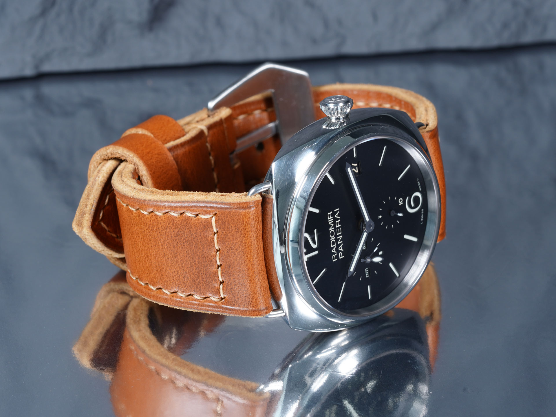 Buckle-side profile showing the sewn vintage style pin buckle, tan and thick