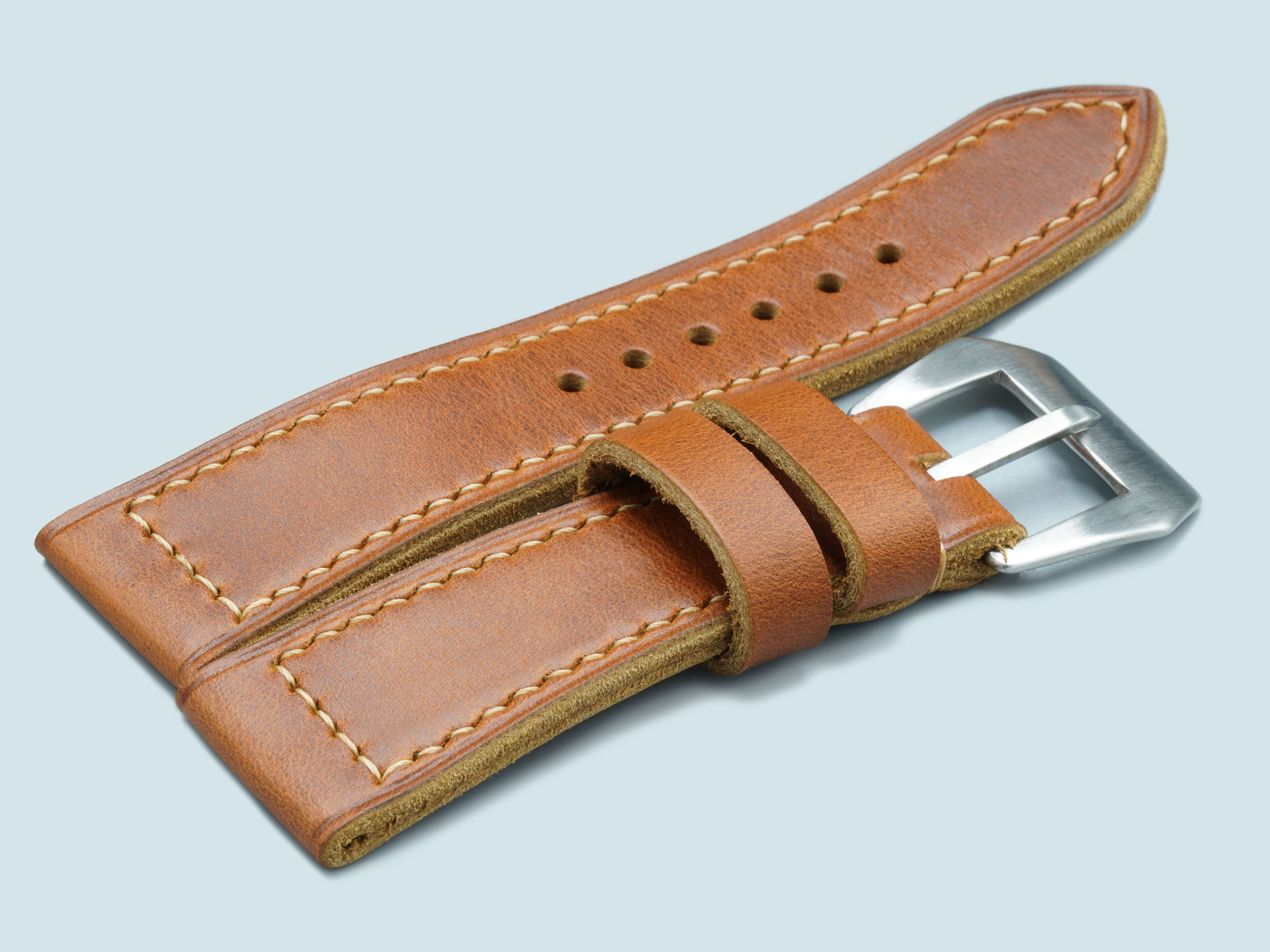 Sewn vintage style pin buckle on a classic tan Radiomir strap