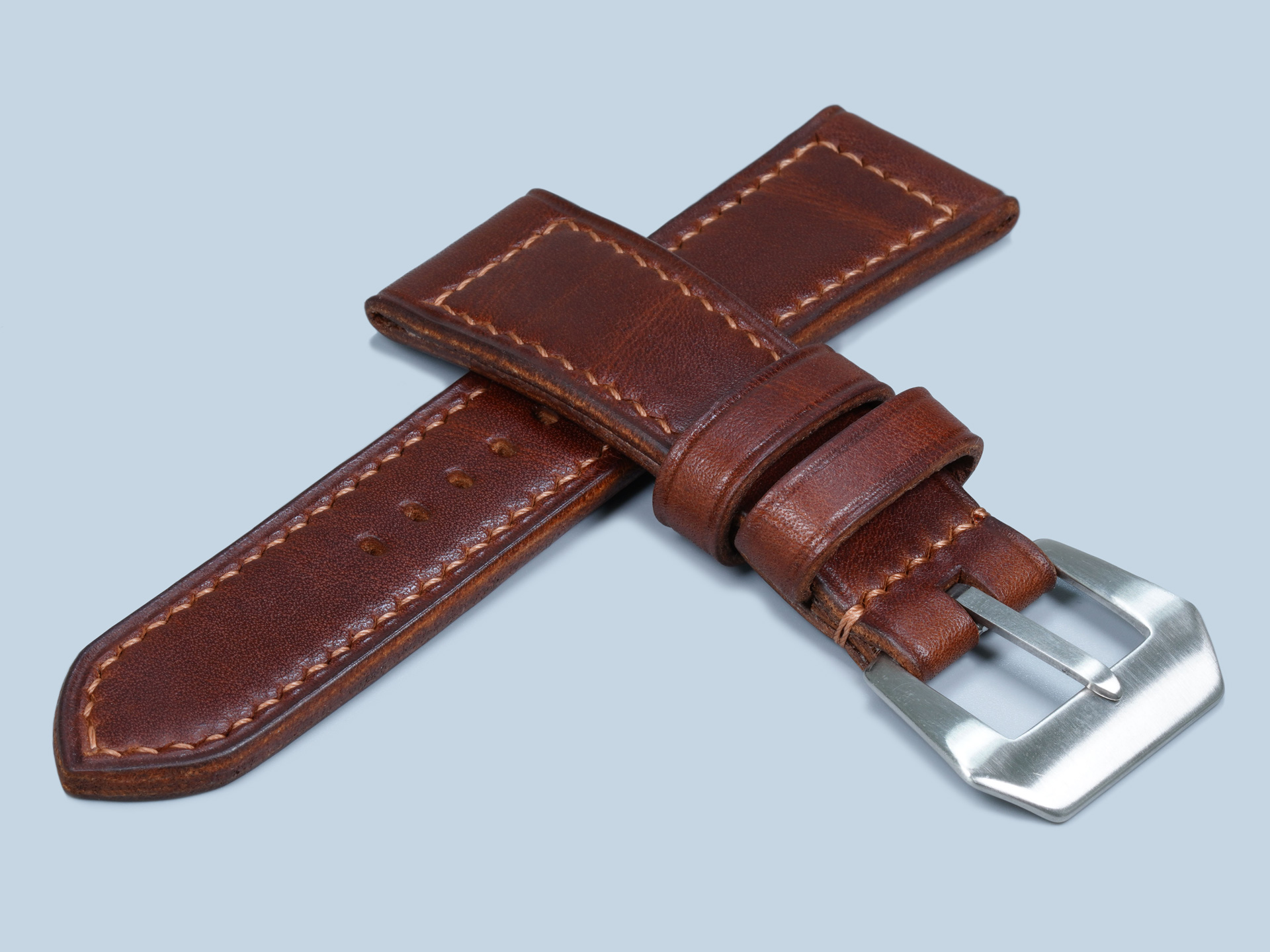 Artisan dark brown leather Radiomir strap featuring hand-stitched details on a Panerai PAM00183 Black Seal.