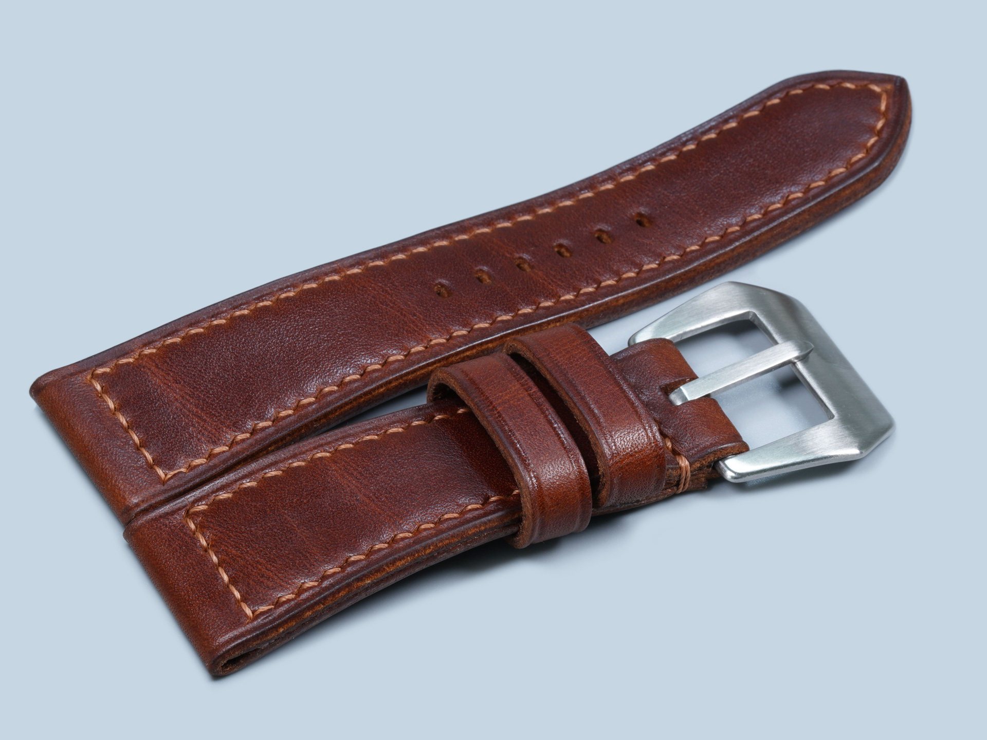 Handcrafted dark walnut leather strap with vintage finish buckle fitted on Panerai Radiomir PAM00183 dial.