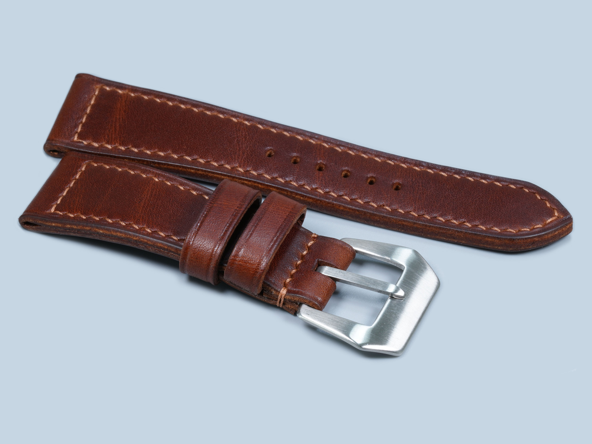 Side profile of supple dark brown Panerai Radiomir leather strap paired with a PAM00183 Black Seal case.