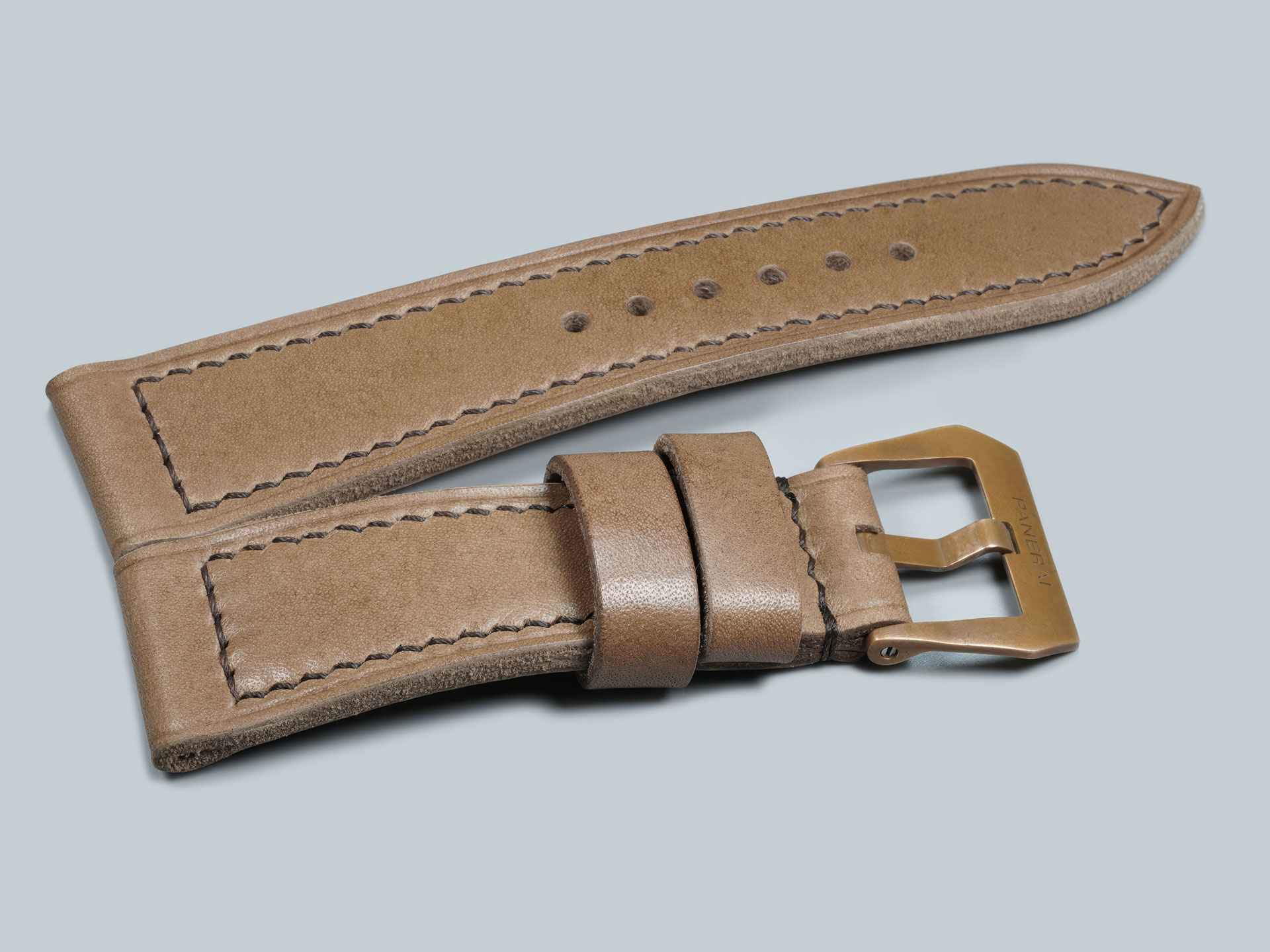Edge crease detail on a custom Panerai Bronzo strap for PAM00968, handmade in limited hide.