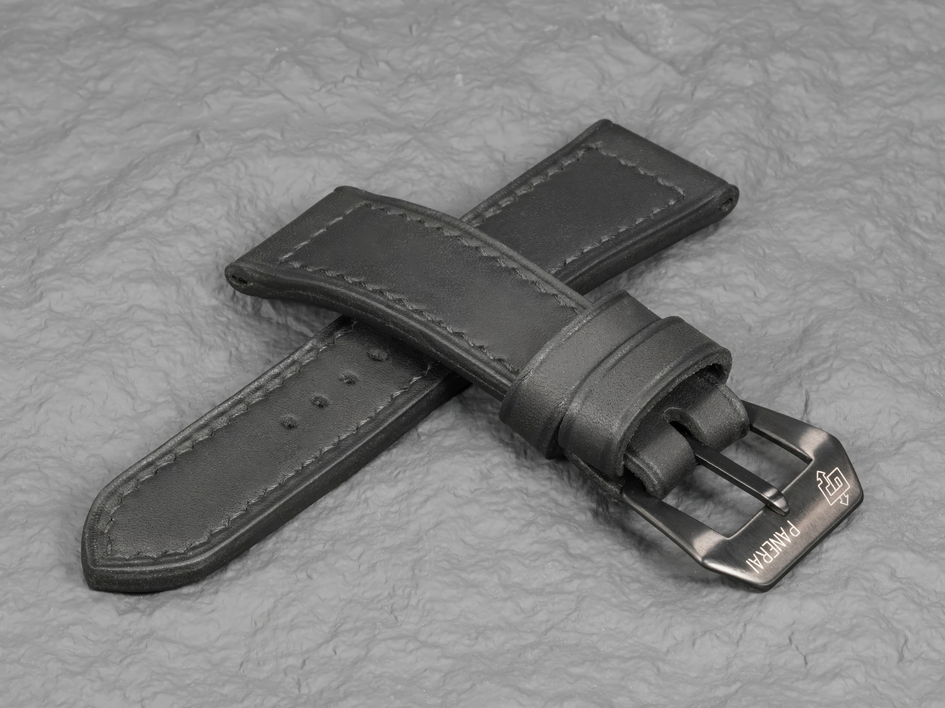 PAM 292 strap showing hand-finished edge creases and rubber-infused pull-up texture.