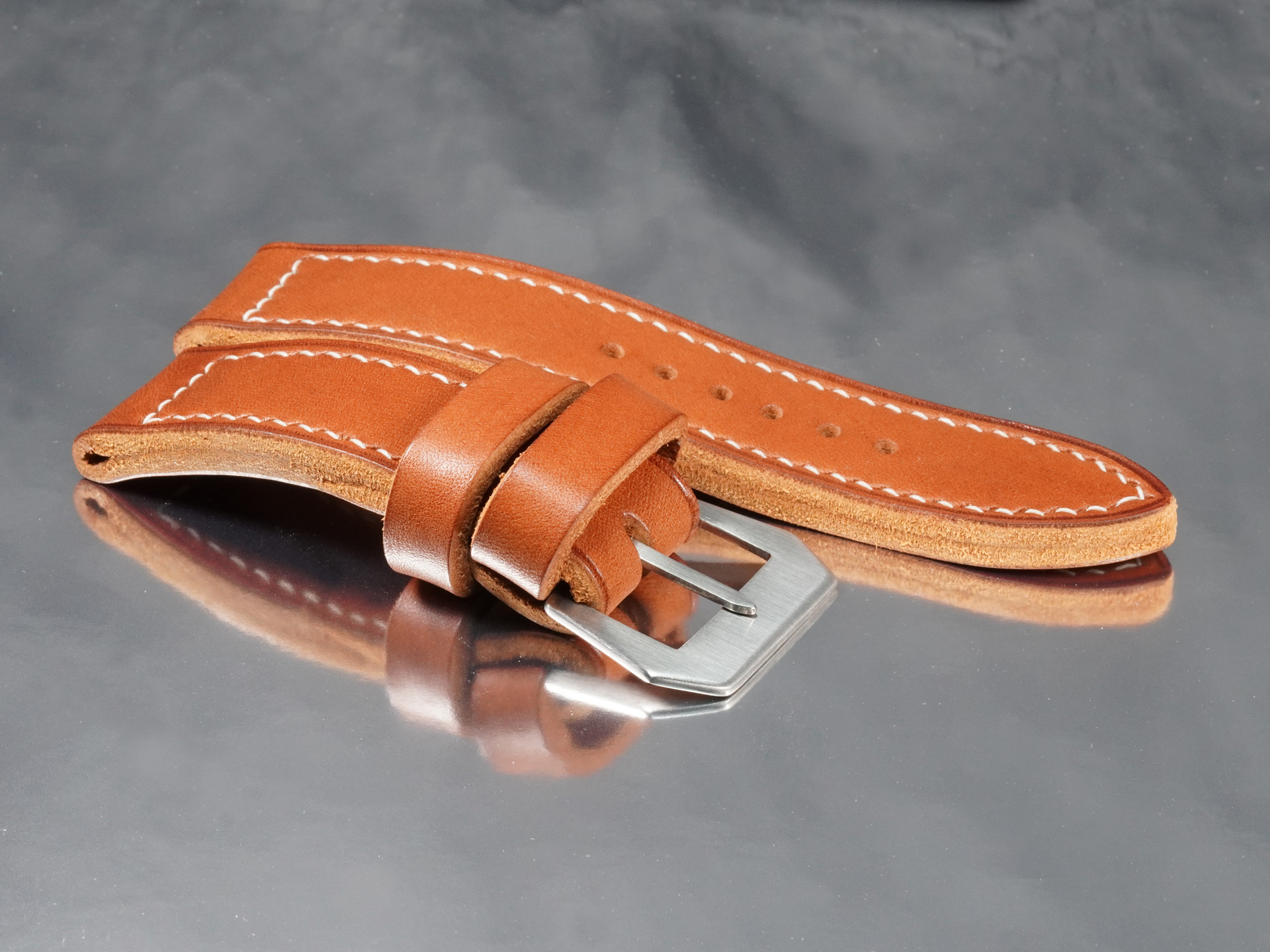 Flat lay of GPF-56 handmade Panerai strap highlighting deep organic grain on Italian leather