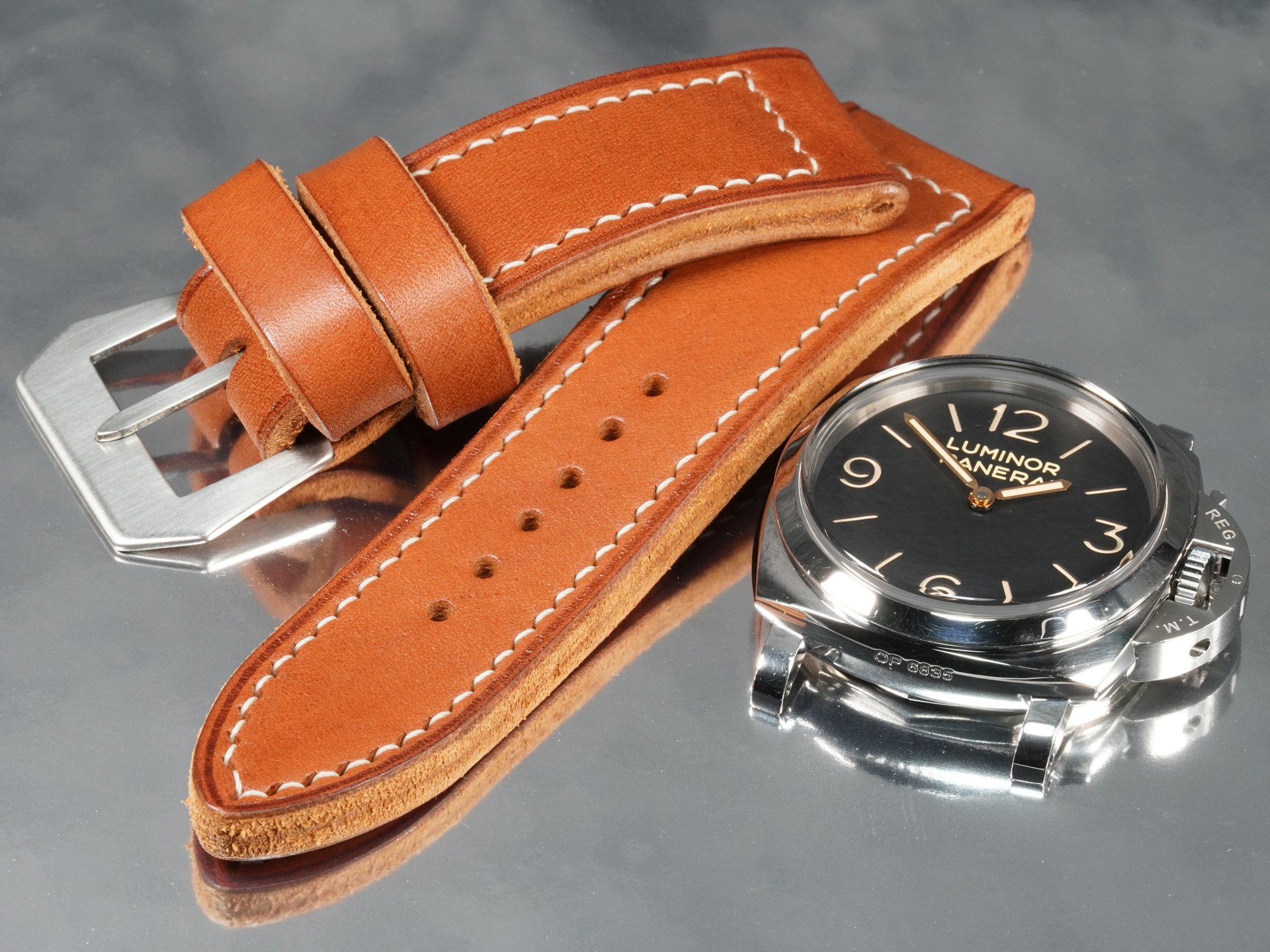 Wide floating keeper loop and beveled edge detailing on custom 26mm thick Panerai strap