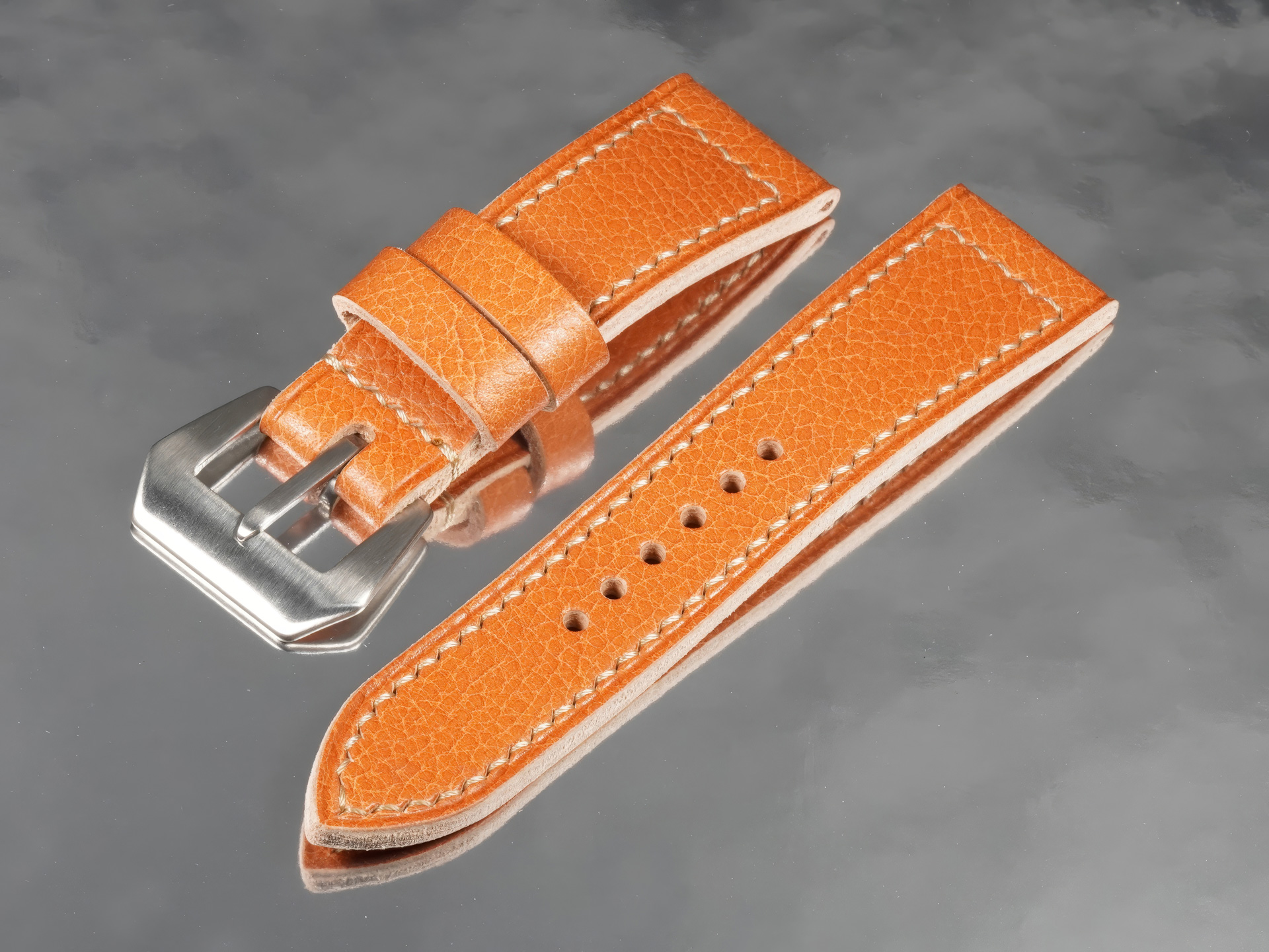 Hand-burnished wax-sealed edges on thick tan custom Panerai Radiomir strap from Marcello Straps