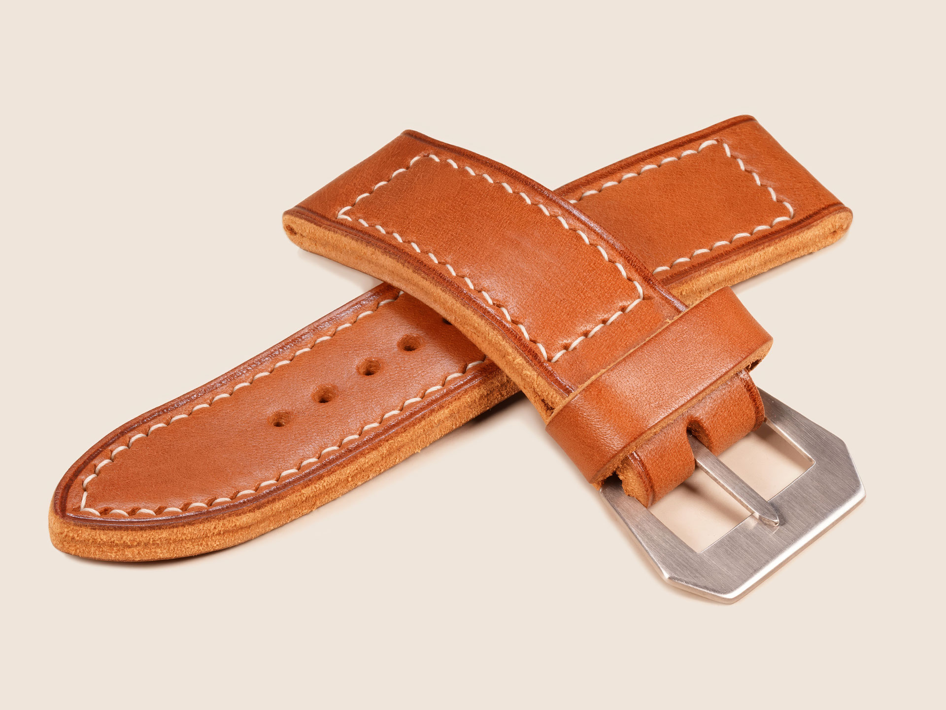 Full-grain vegetable-tanned milled bull hide texture on a custom thick Panerai strap.