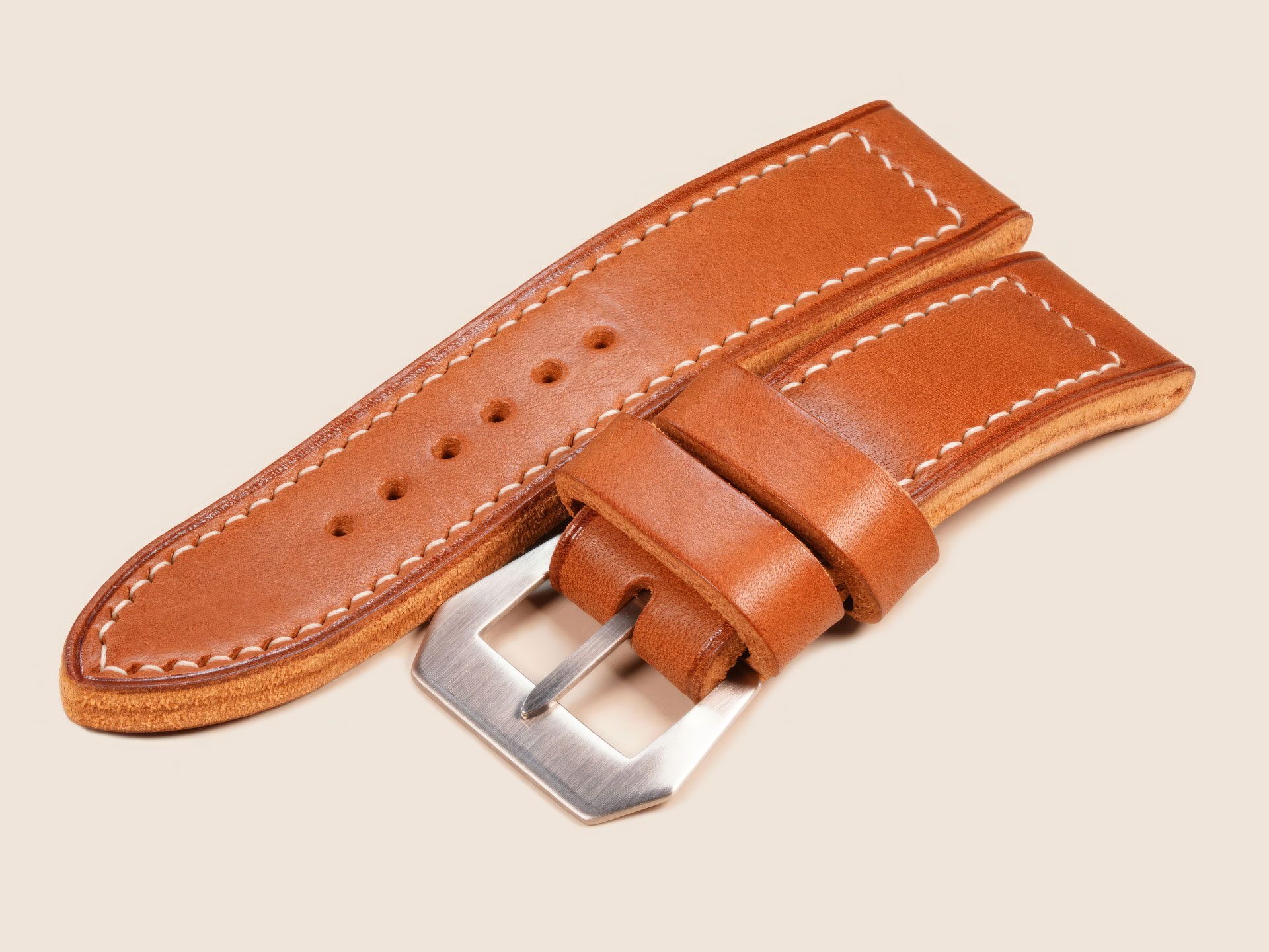 Wrist profile displaying the 6.4mm thick Panerai strap paired with a 47mm PAM 372.