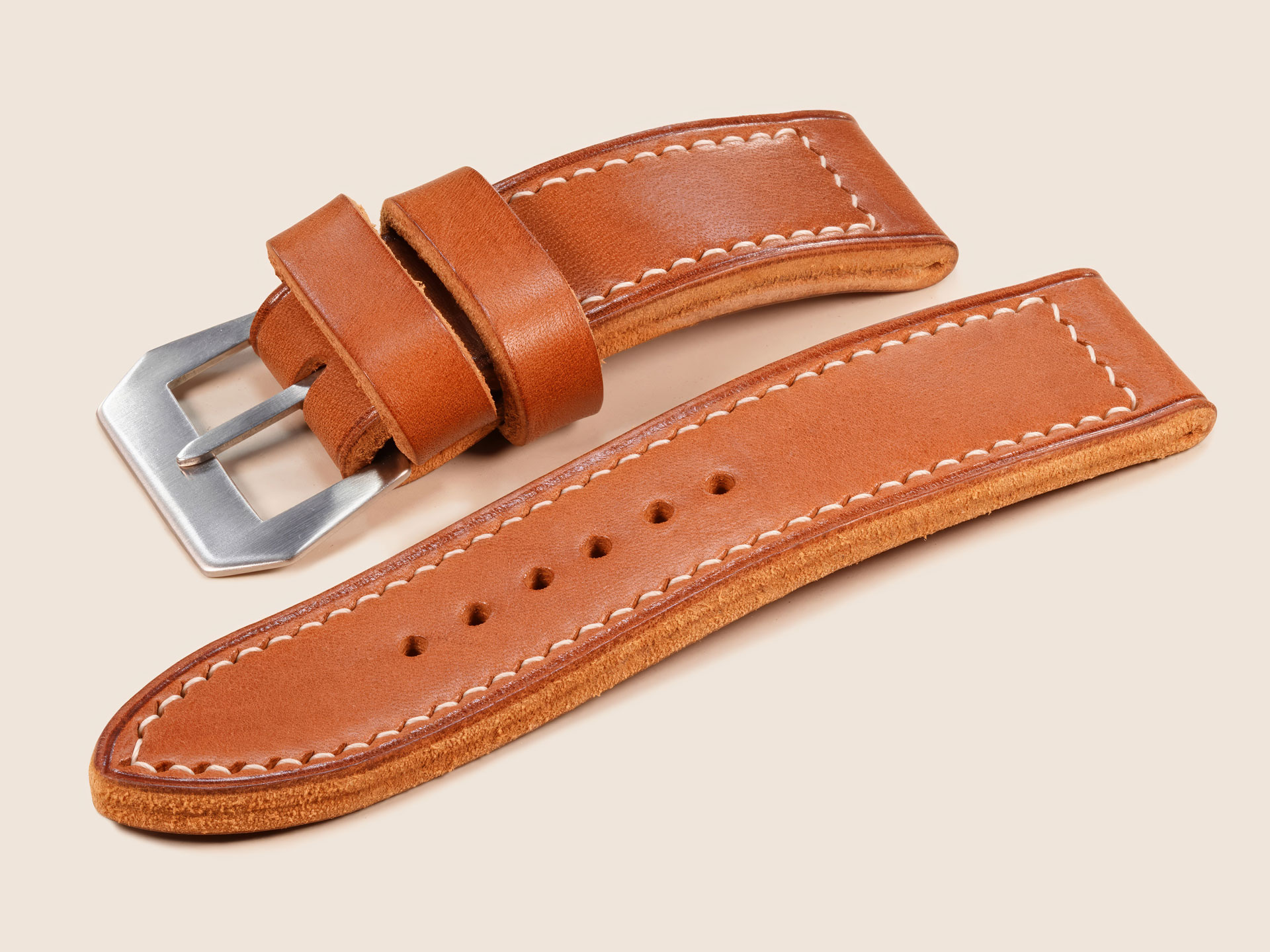 Soft temper flexibility test of the GPF-56 tan thick Panerai strap by Marcello Straps.