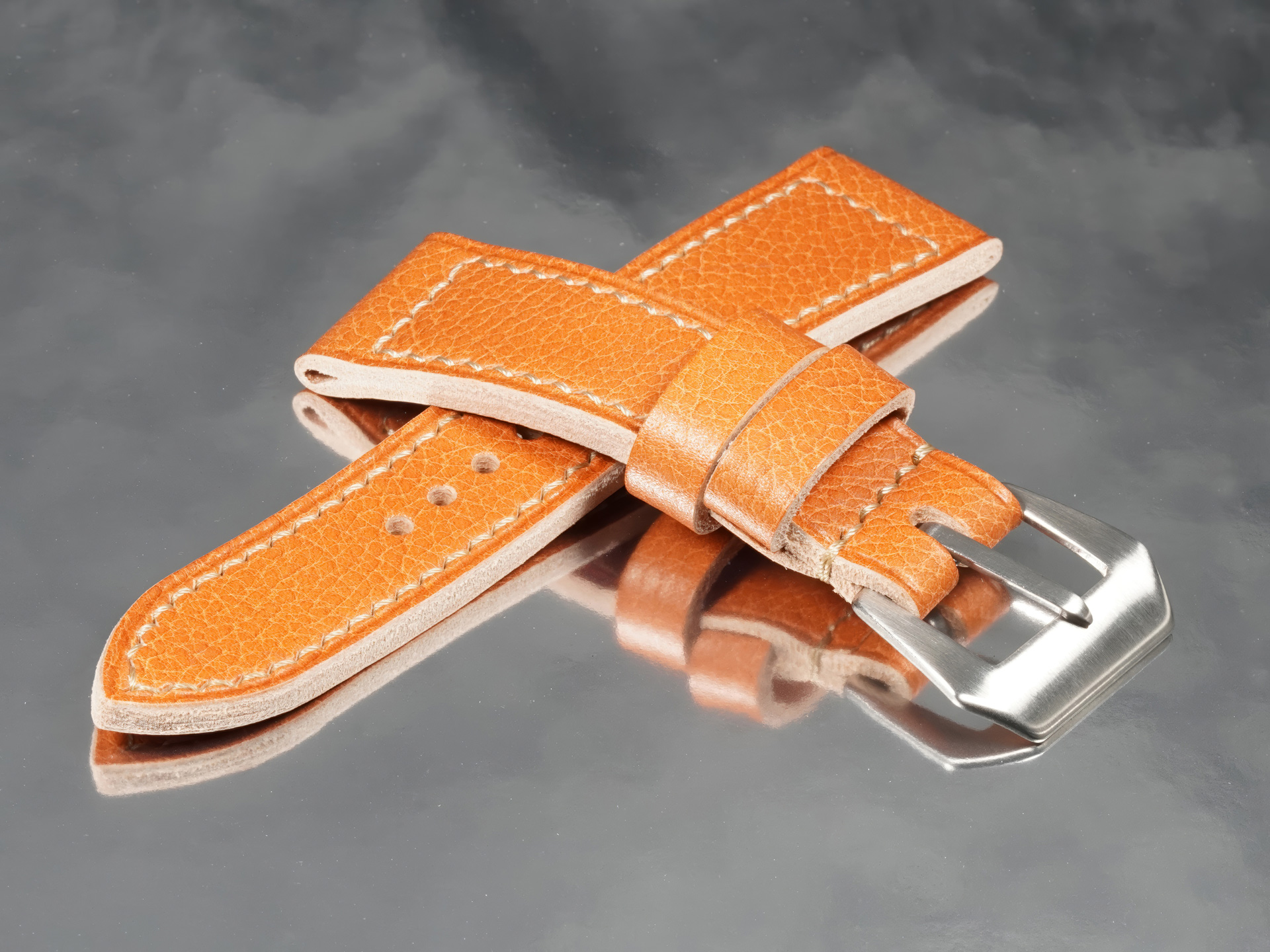 Top grain pull-up texture of handmade tan custom Panerai Radiomir strap from Marcello Straps