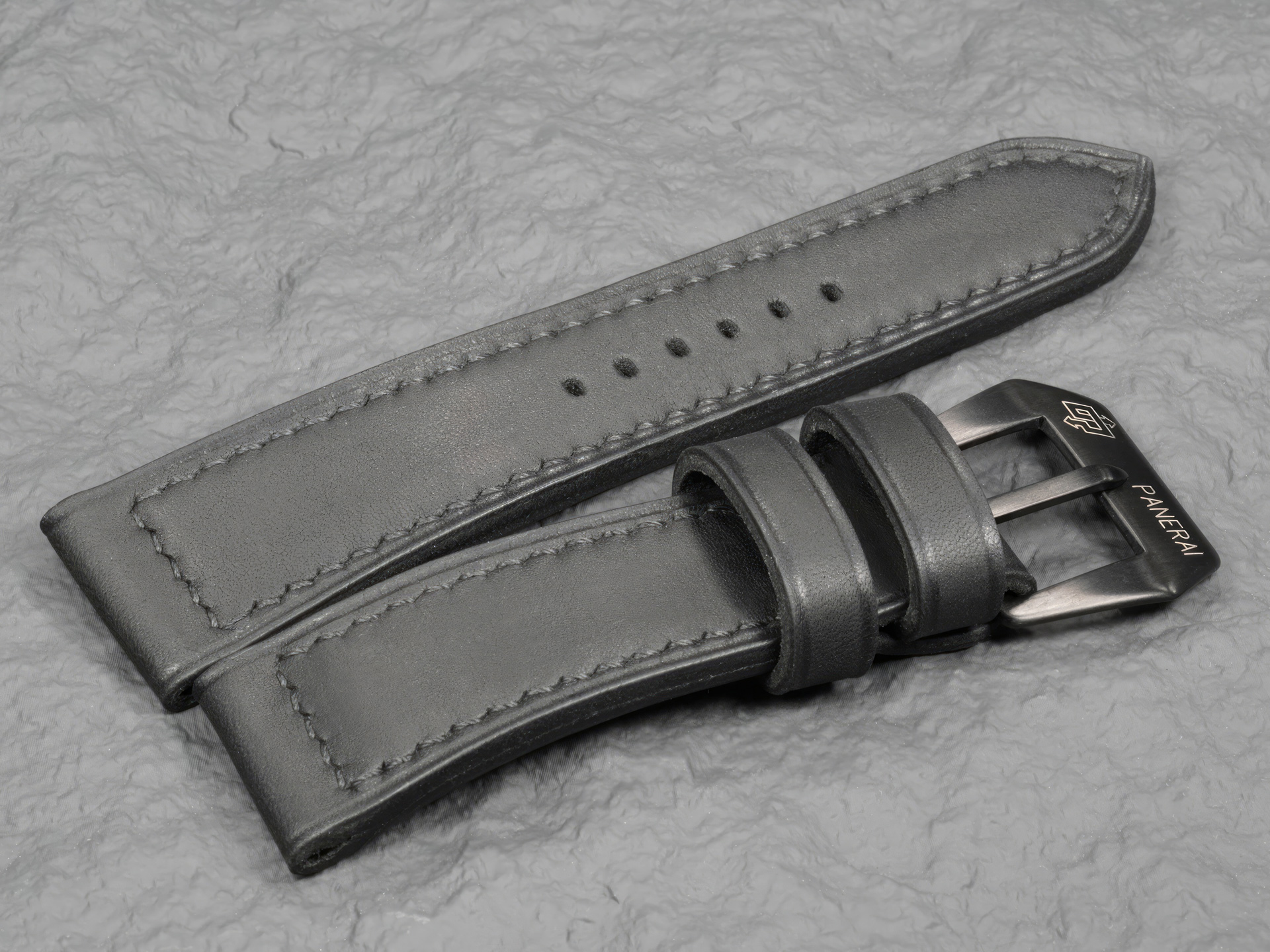 Panerai Radiomir ceramic strap featuring seamless matte black PVD curved pin buckle.