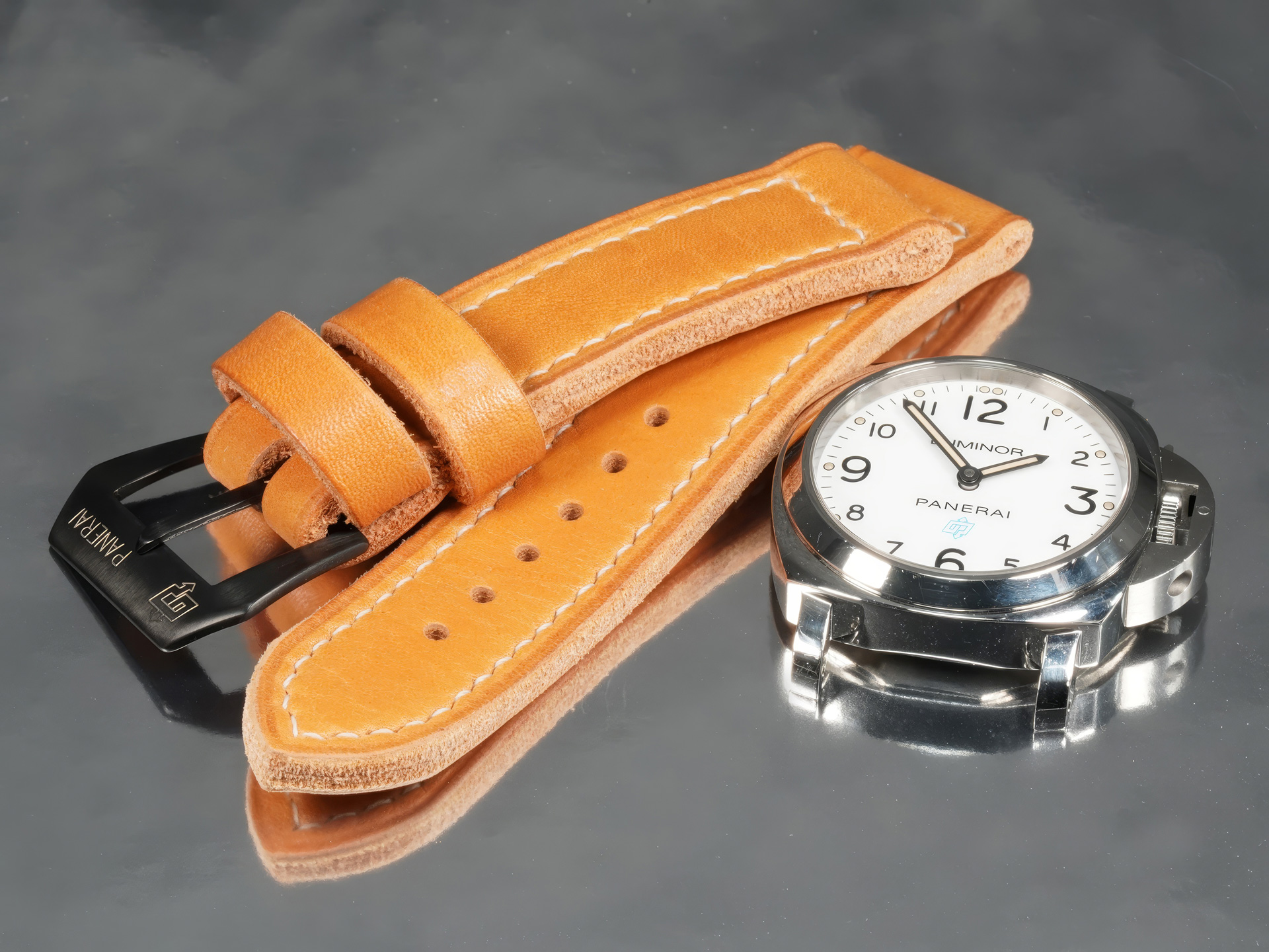 Orange tan leather strap with black hardware handcrafted for Panerai Luminor PAM01707